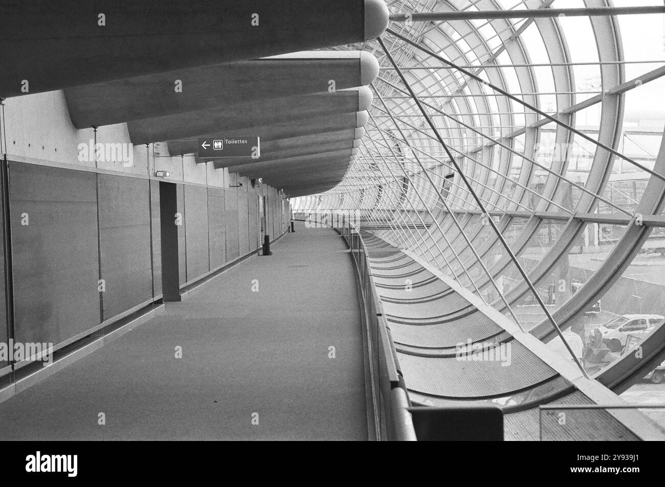 corridor at the Paris airport between concrete and steel glass, desert as the future is outlined Stock Photo