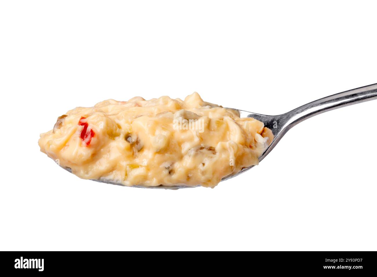 Metal spoon with homemade sandwich spread on white background close up Stock Photo