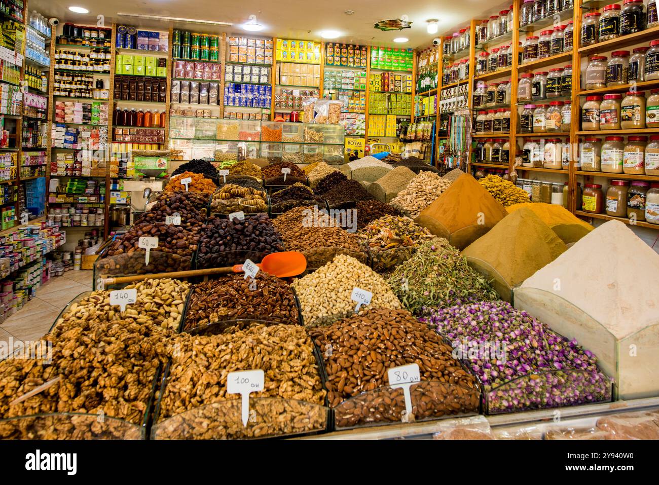 Spices and dry goods in the shops along narrow cobblestone streets of Kasbah in Bab Al Fahs, old Medina, Tangier, Morocco, North Africa, Africa Stock Photo