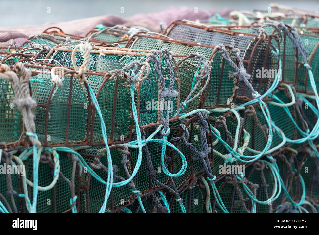 Fishing nets stacked on boat hi-res stock photography and images - Alamy