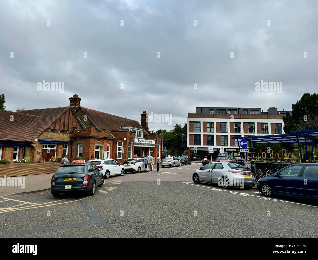 Letchworth, Herts - September 2024 :Letchworth Garden City railway station  with parking at front close to a taxi rank. - Smartphone Captured Stock Image