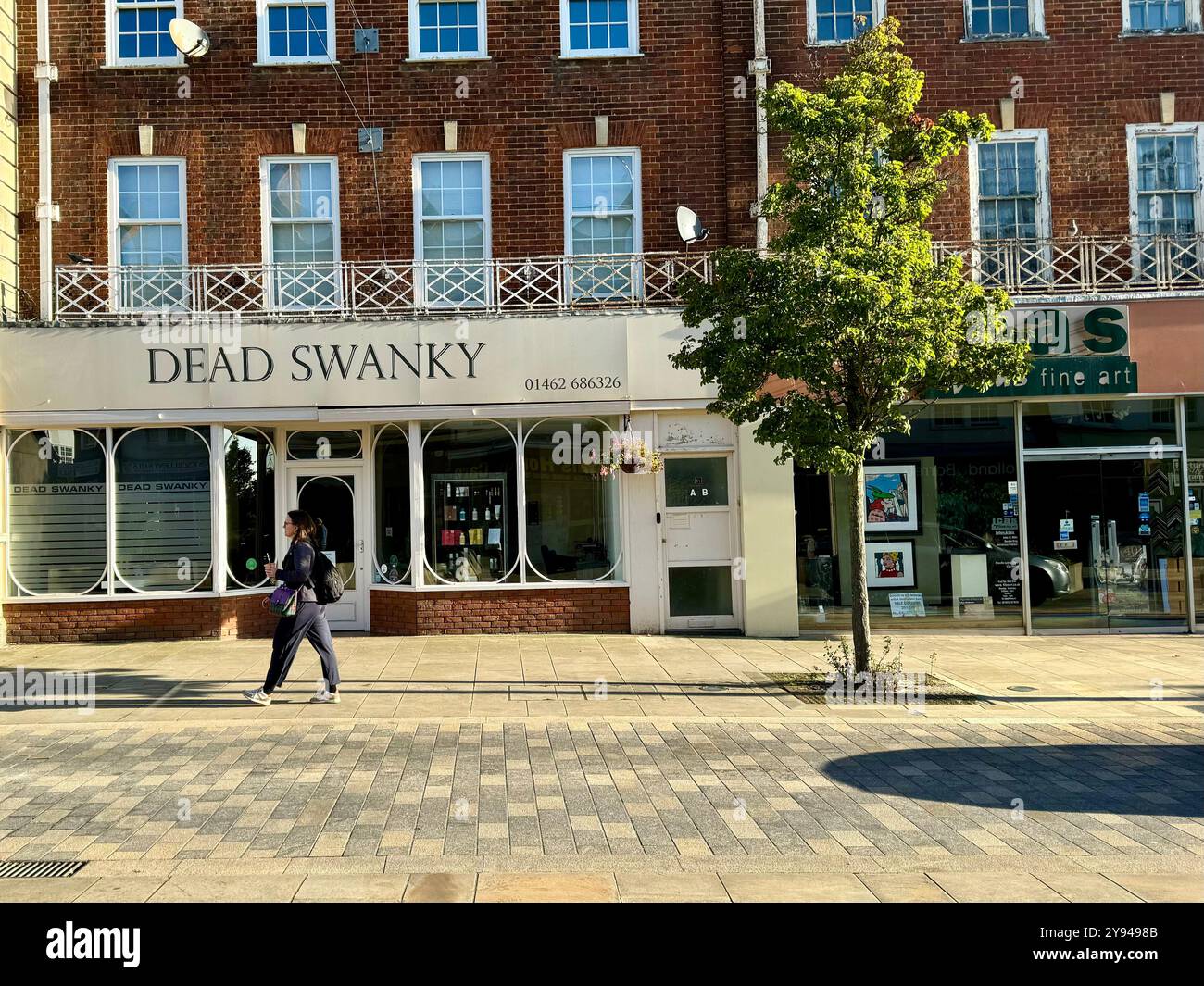 Letchworth, Herts - September 2024 : Dead Swanky hairdresser salon in the town centre. - Smartphone Captured Stock Image