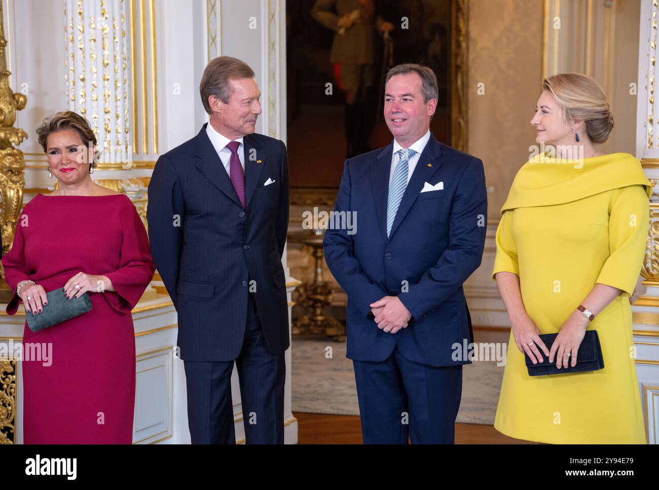 Luxemburg, Luxembourg. 08th Oct, 2024. Prince Guillaume (2nd from right), Hereditary Grand Duke of Luxembourg, stands next to his mother, Grand Duchess Maria Teresa (l-r), his father, Grand Duke Henri, and his wife Princess Stephanie in the ducal palace after his appointment as 'Lieutenant-Représentant' (honorary lieutenant). Grand Duke Henri has appointed his son Prince Guillaume as Governor, thus initiating the handover of office. The 42-year-old now takes over certain tasks from his father, while the latter remains Head of State. Credit: Harald Tittel/dpa/Alamy Live News Stock Photo