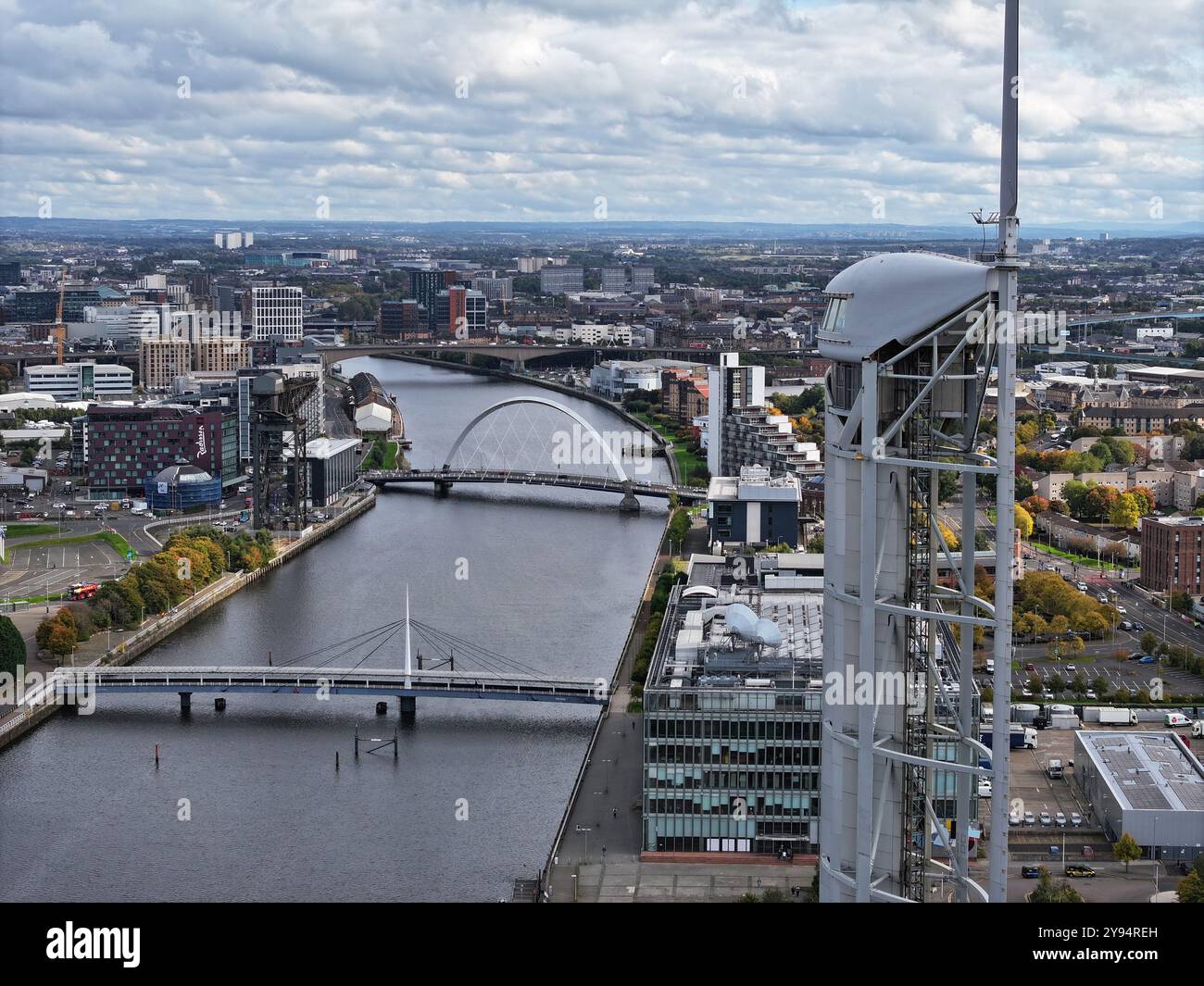Aerial drone view of River Clyde and Glasgow city centre from behind Science centre tower Stock Photo