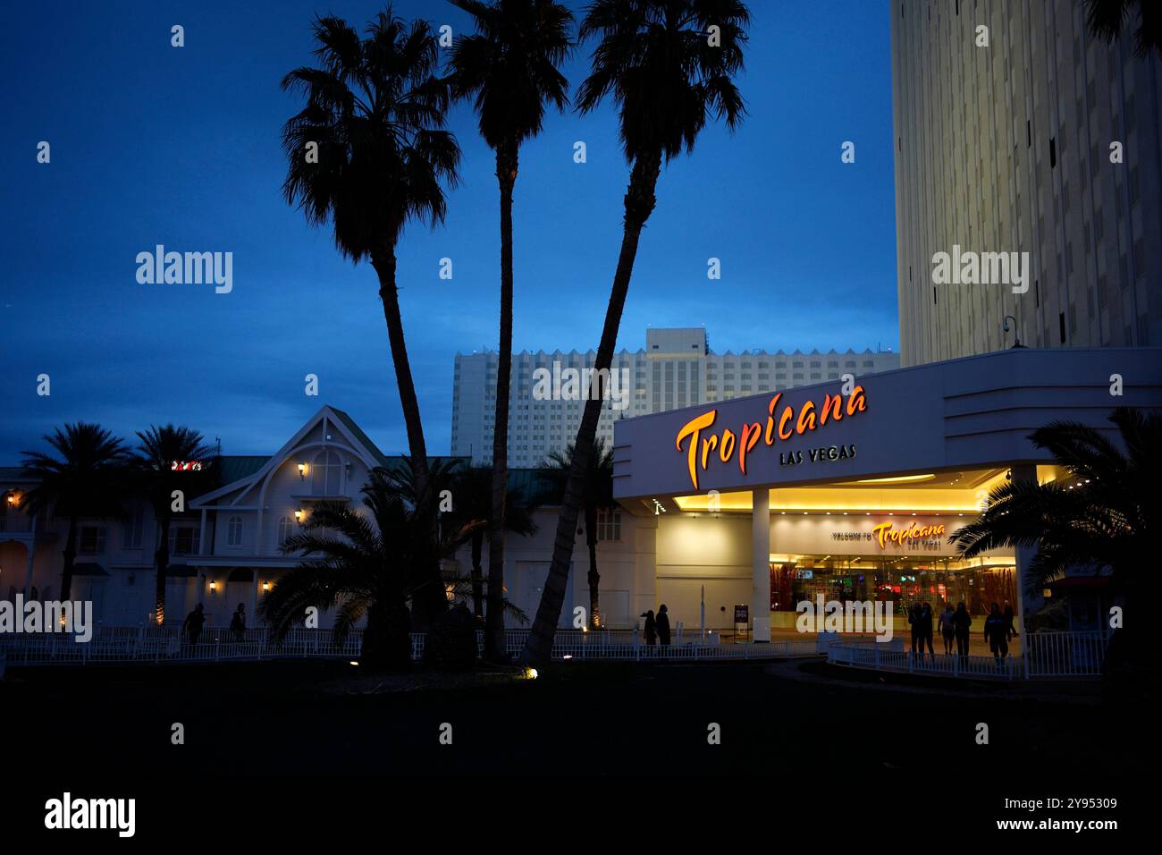 FILE - People walk outside of the Tropicana hotel-casino Thursday ...