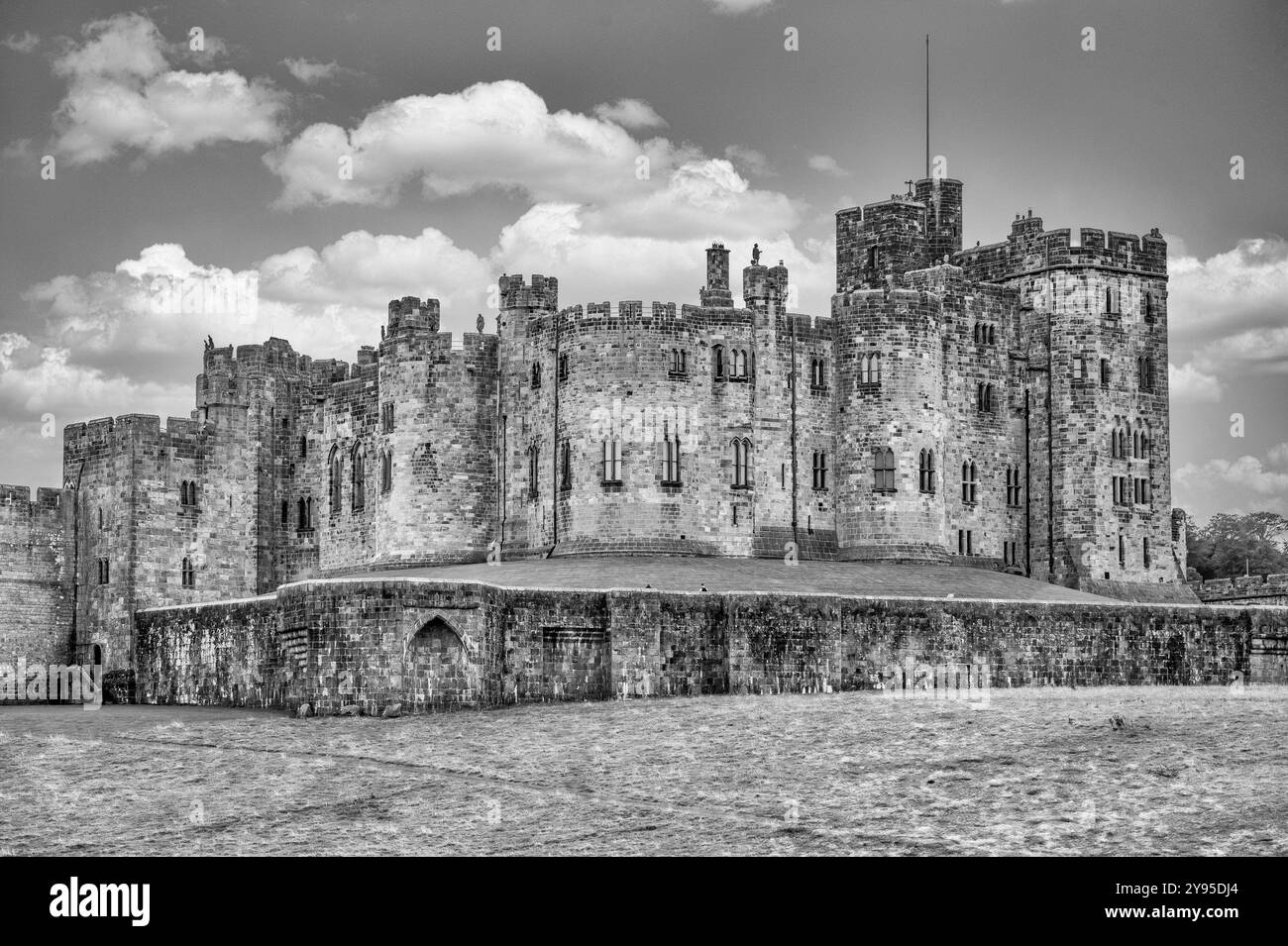 The image is of Alnwick Castle in Northumberland on the northeast coast of England and site for Kevin Costner's film Robin Hood Prince of Thieves Stock Photo