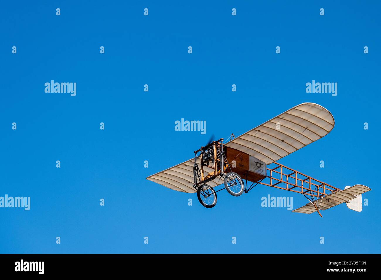 An old Blériot aircraft is flying in the sky. Radio Controlled Aircraft ...