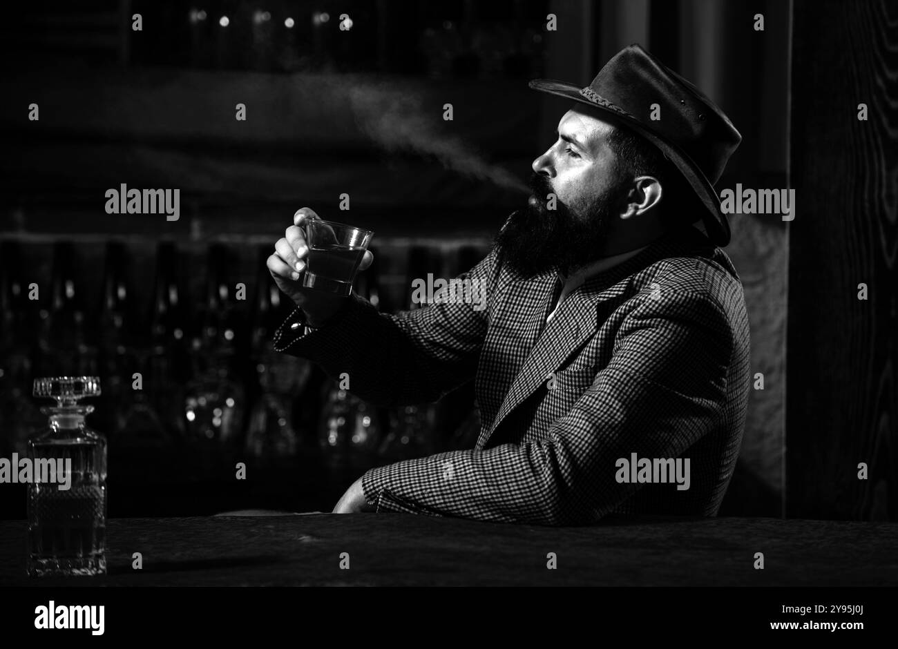 Man with a cigarette and a whiskey. Stock Photo