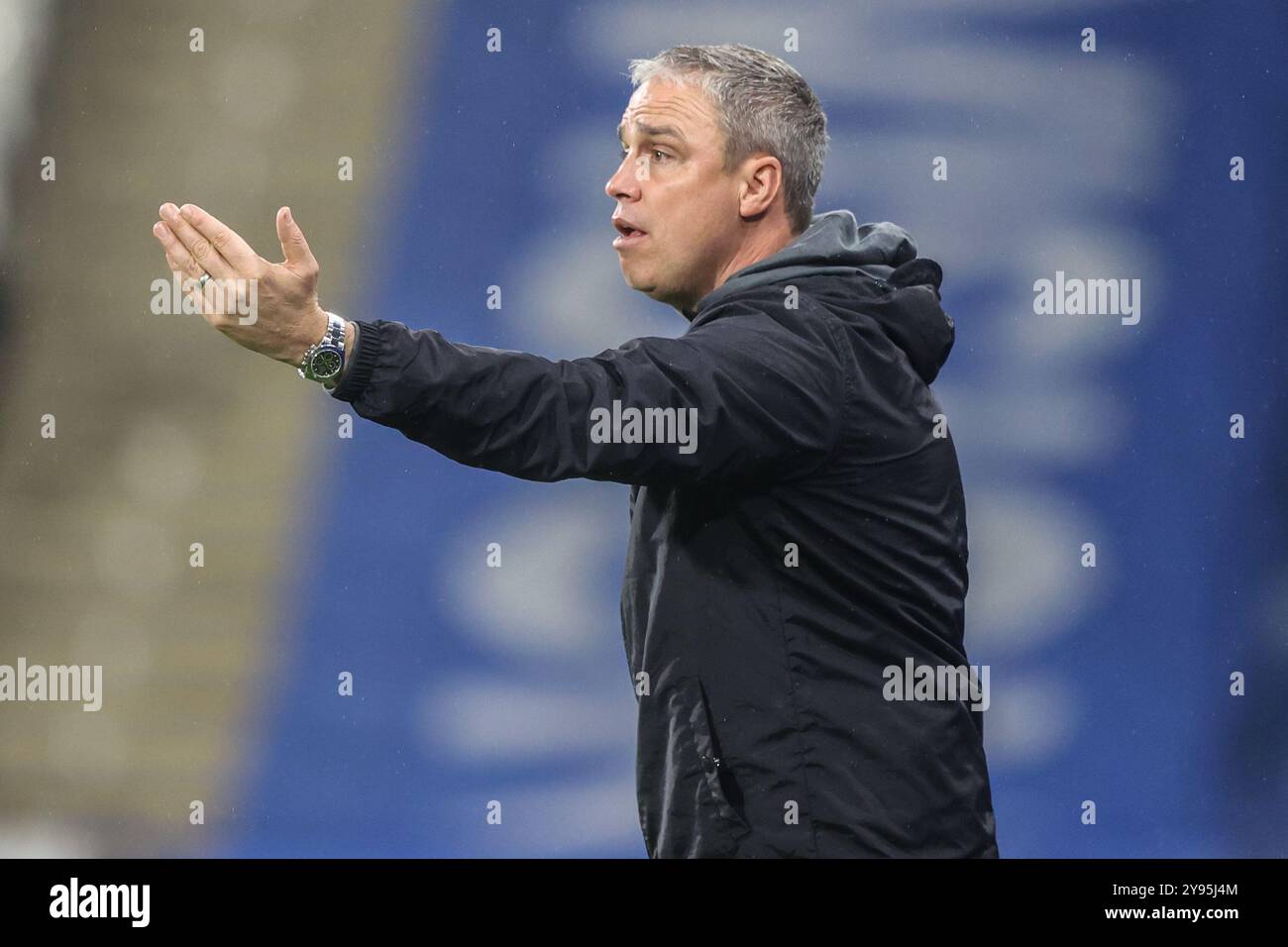 Huddersfield, UK. 08th Oct, 2024. Michael Duff manager of Huddersfield Town gives his team instructions during the Bristol Street Motors Trophy match Huddersfield Town vs Barnsley at John Smith's Stadium, Huddersfield, United Kingdom, 8th October 2024 (Photo by Alfie Cosgrove/News Images) in Huddersfield, United Kingdom on 10/8/2024. (Photo by Alfie Cosgrove/News Images/Sipa USA) Credit: Sipa USA/Alamy Live News Stock Photo