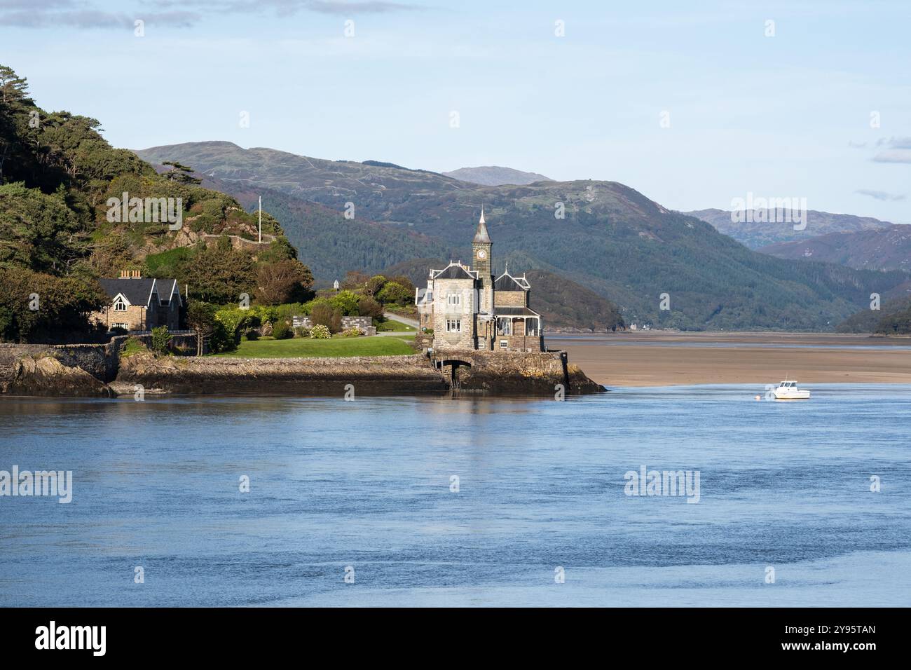 Coes Faen Hall stands on a promontory in the Mawddach estuary under the hills of Snowdonia in North Wales. Stock Photo