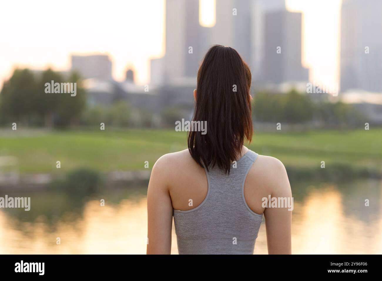 Back view of a young woman Stock Photo - Alamy