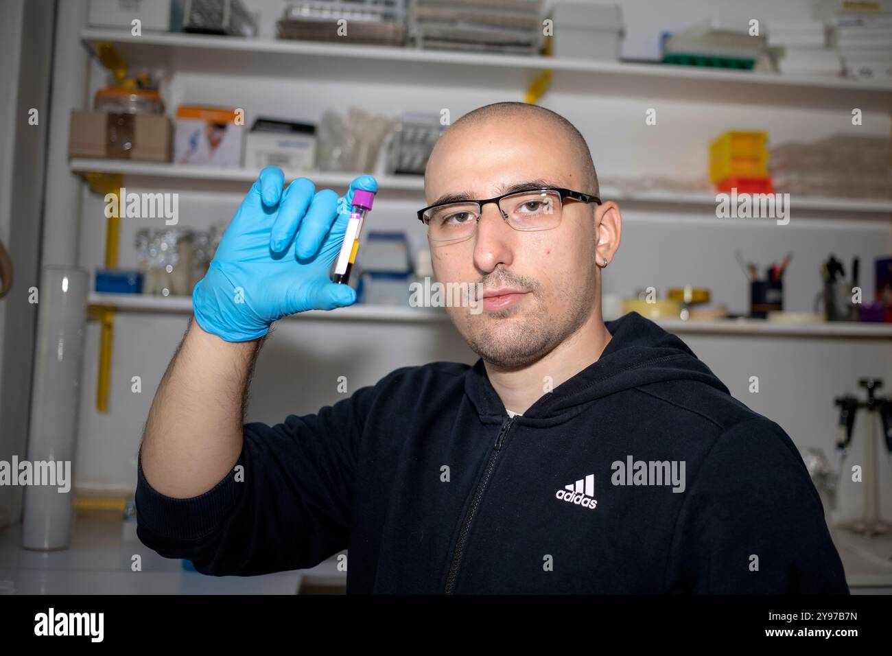 Scientist analyzing a sample hi-res stock photography and images - Alamy