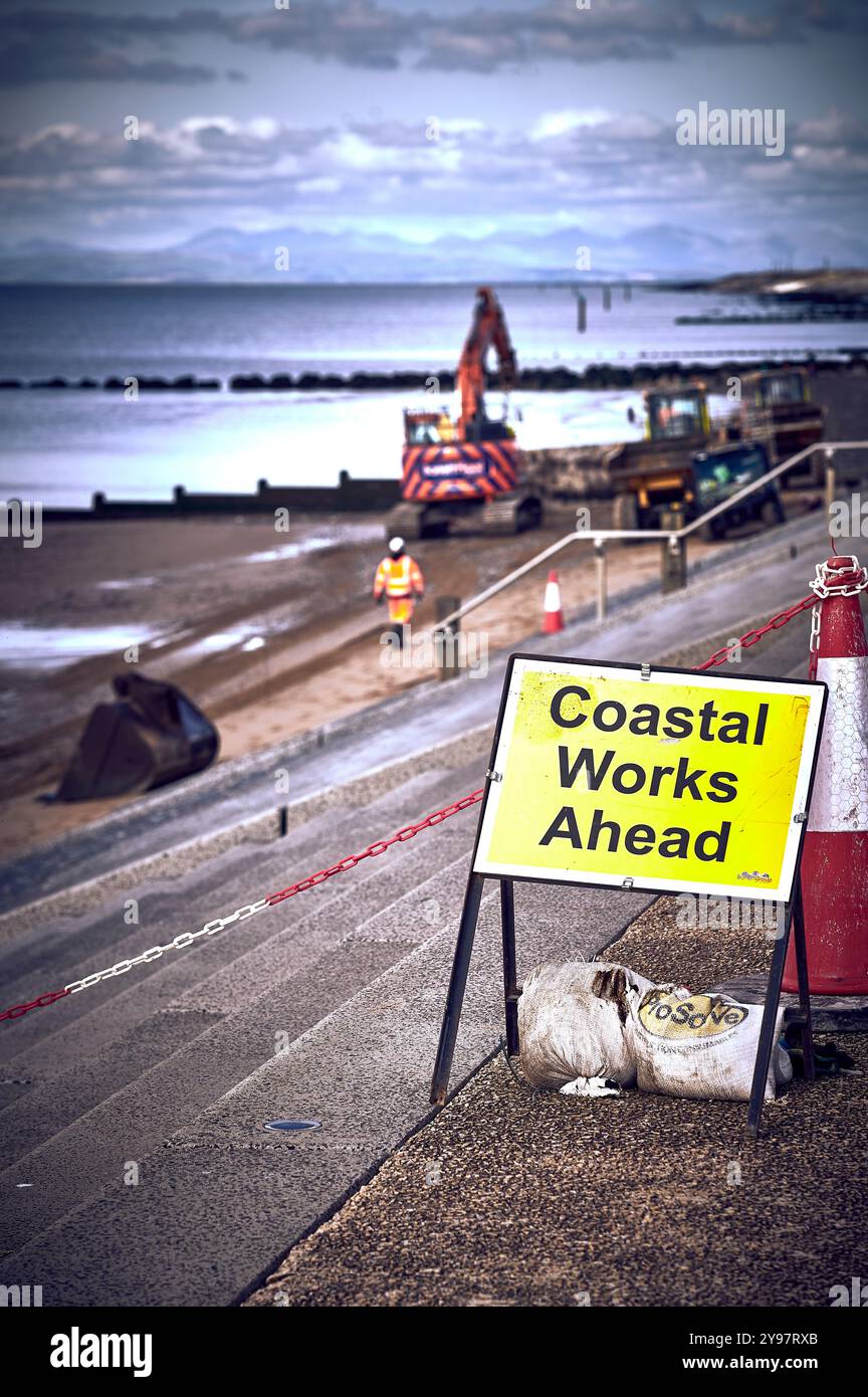 Carrying out sea defences work on Cleveleys beach,UK Stock Photo