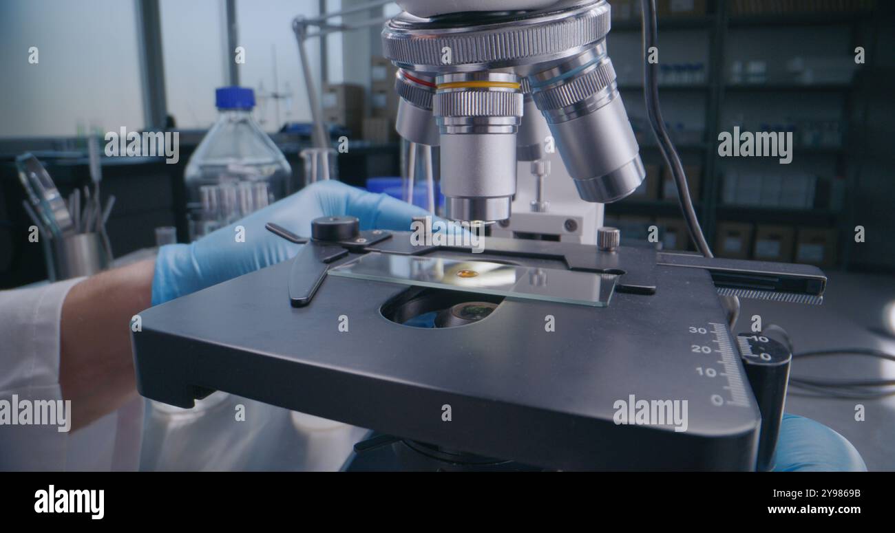 Drug Testing Microscope Medical science laboratory: Close up of professional microbiologist or ...