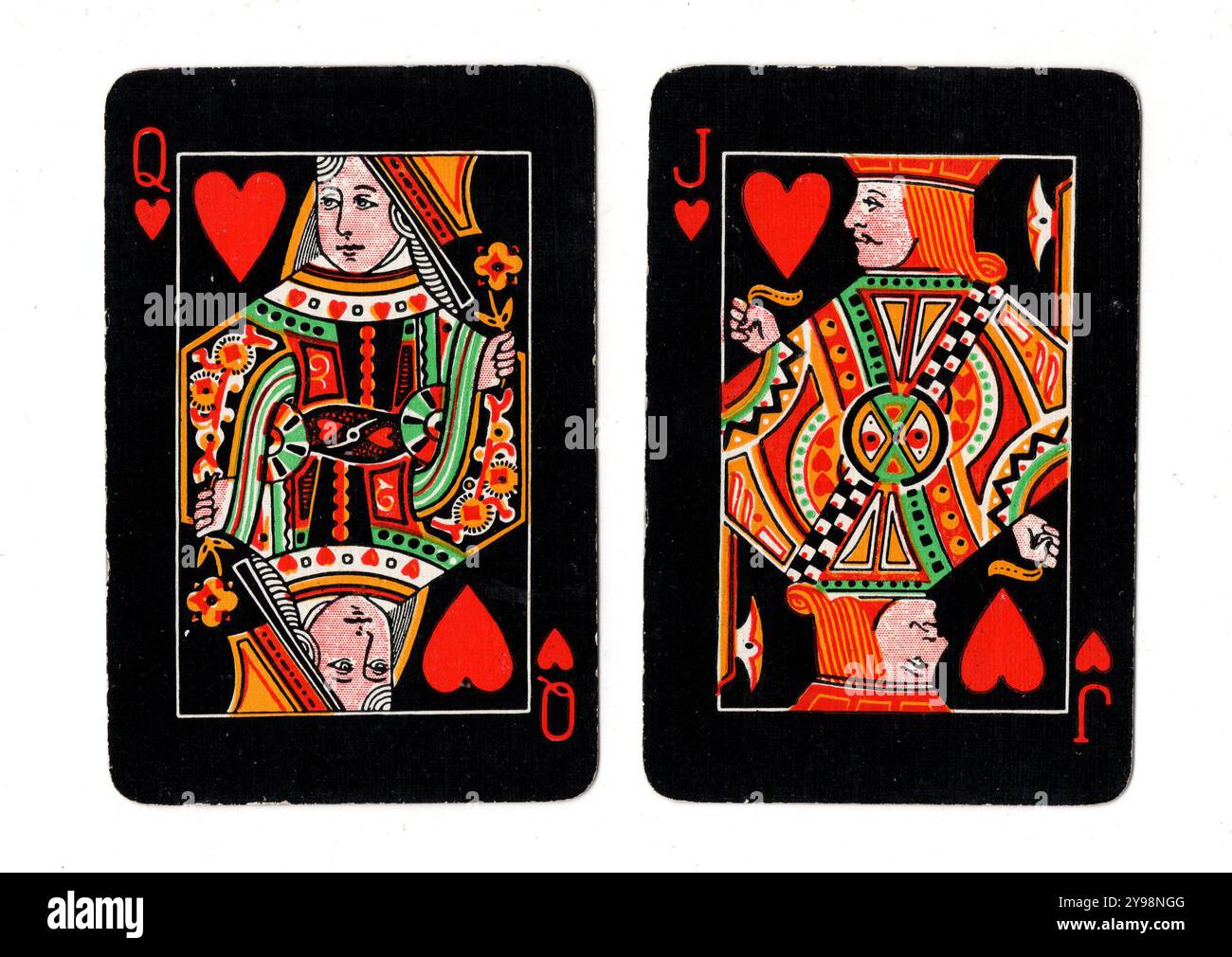 A blackjack hand of vintage playing cards on a white background 