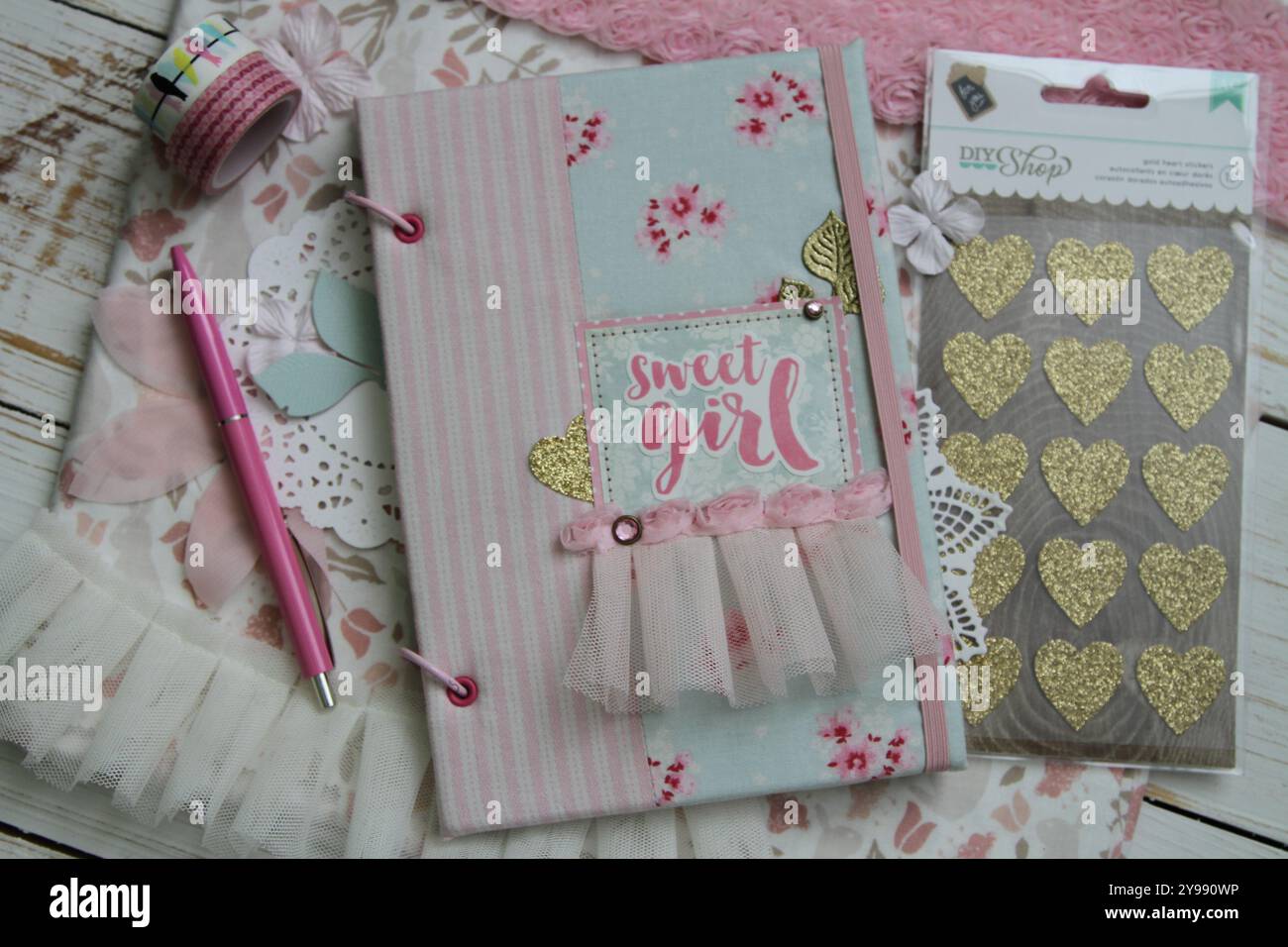 Scrapbooking handmade textile baby book and accessories Stock Photo
