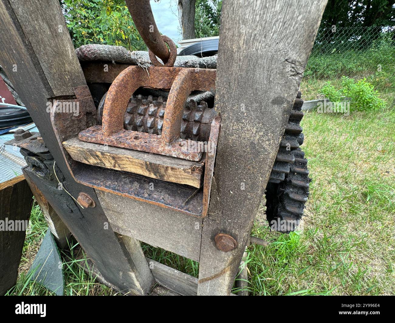 Transmission mechanism of a manual animal feed grinder. Gears of an old ...
