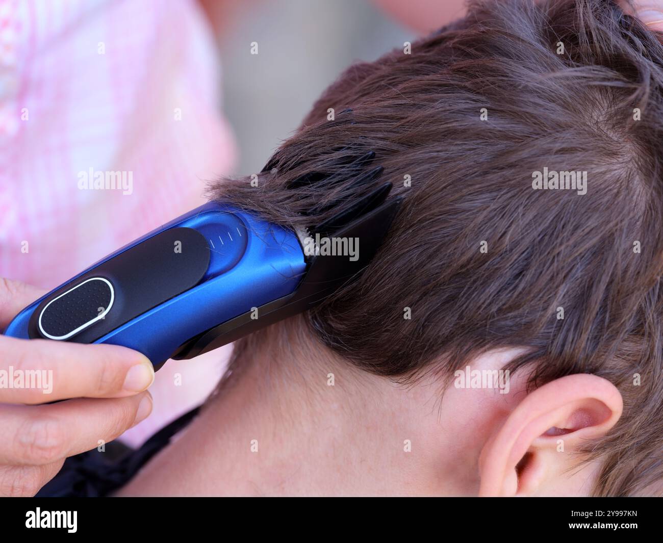 Hairdresser cutting hair boy hires stock photography and images Alamy