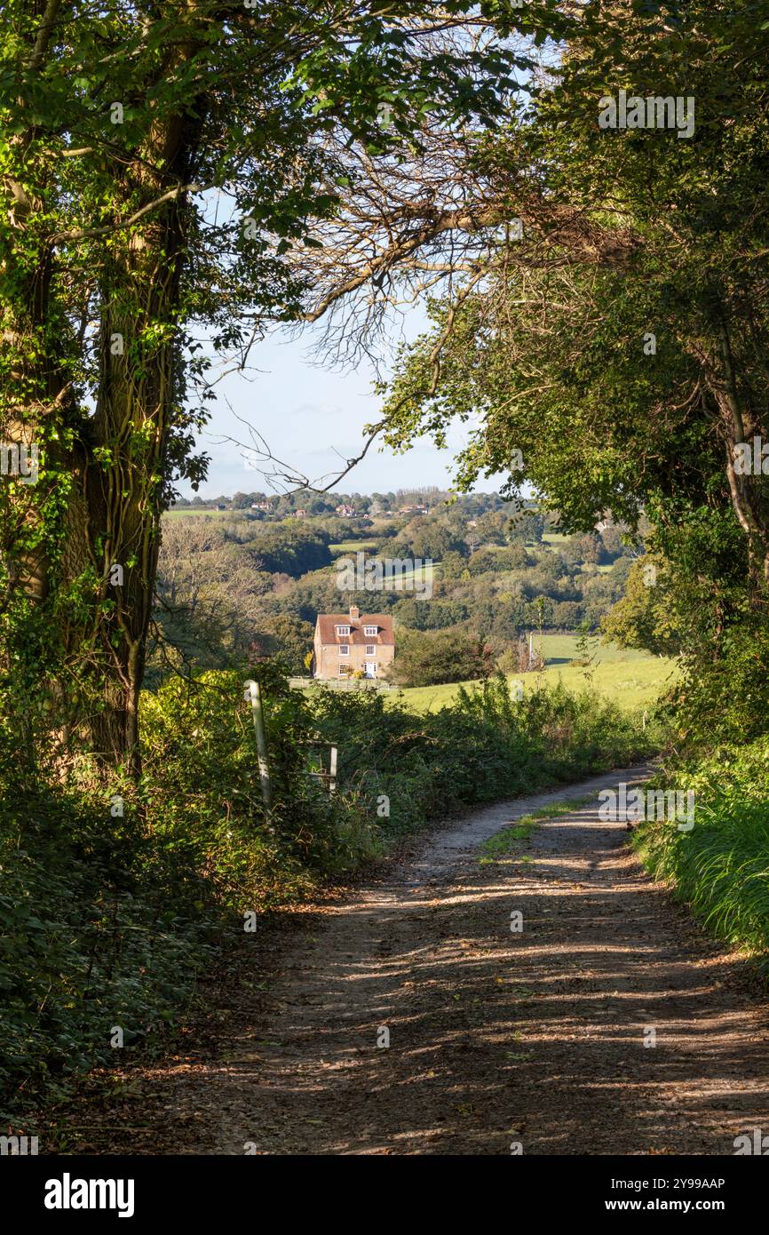 View of High Weald landscape with farmhouse along Ham Lane, Burwash, East Sussex, England, United Kingdom, Europe Stock Photo