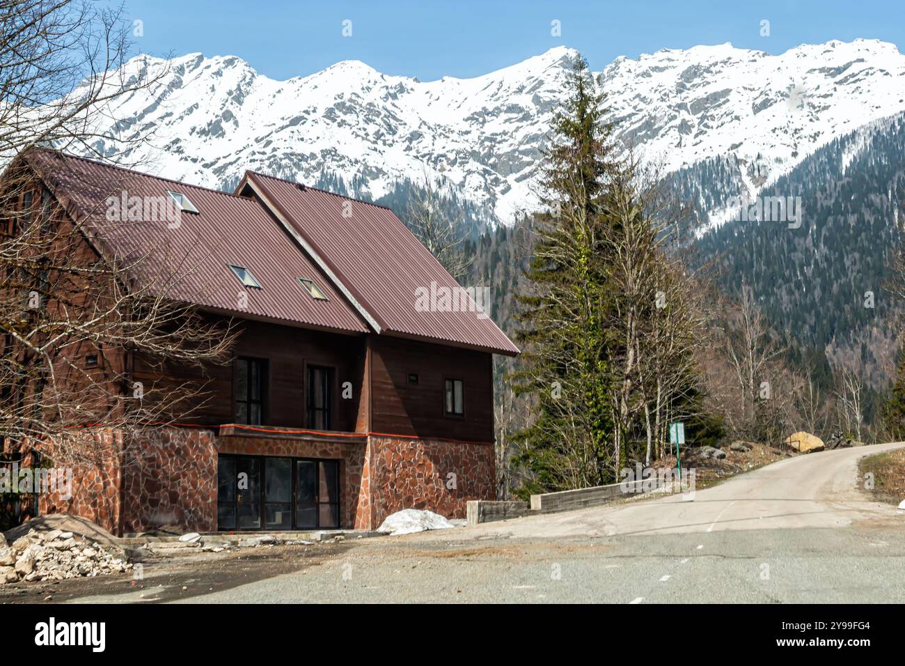 Two-storey cottage with a view of the picturesque snow-capped mountain ...