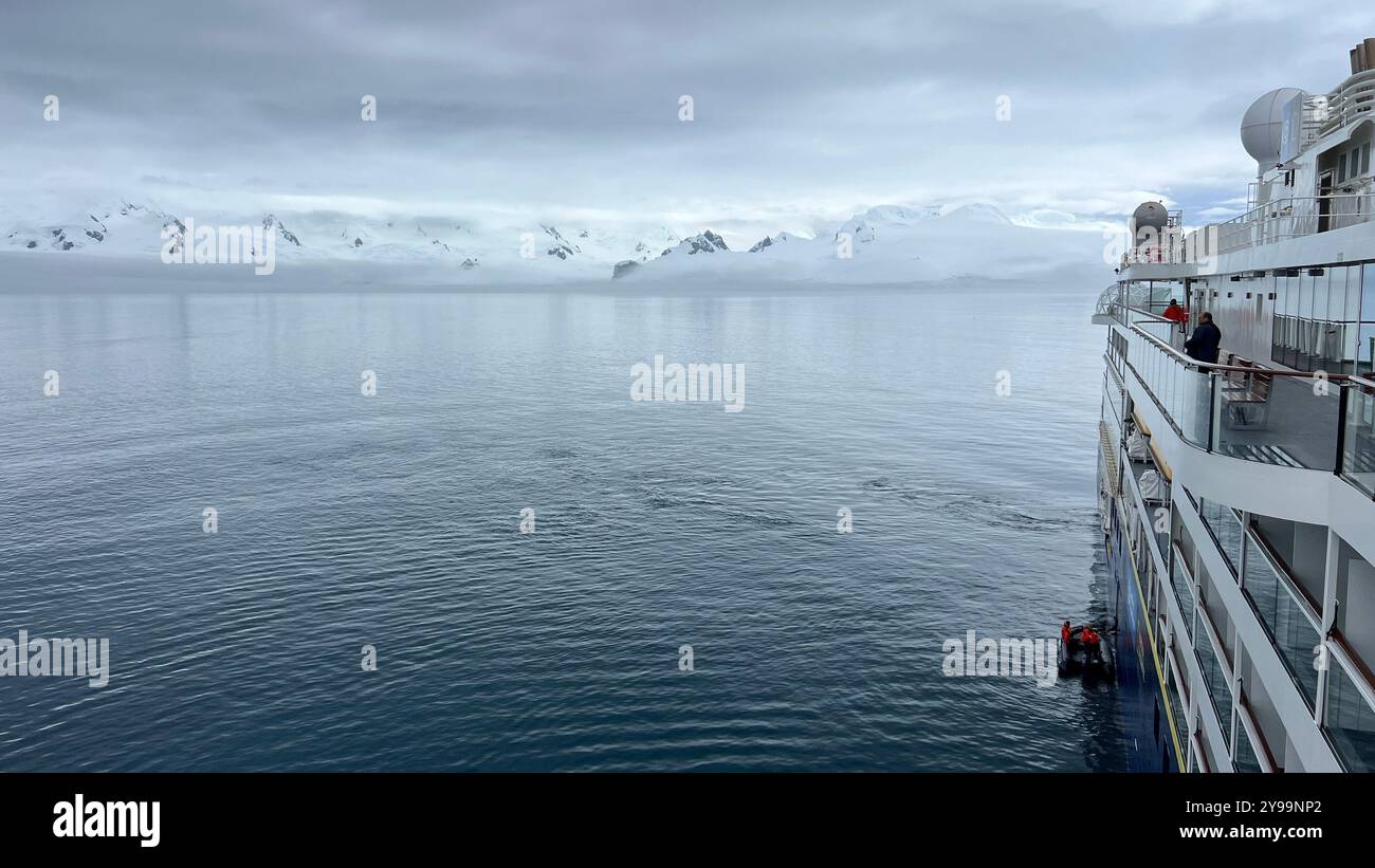 The Lindblad Nat Geo Endurance cruises through the calm waters of the Southern Ocean, as passengers prepare for an Antarctic expedition - Smartphone Captured Stock Image