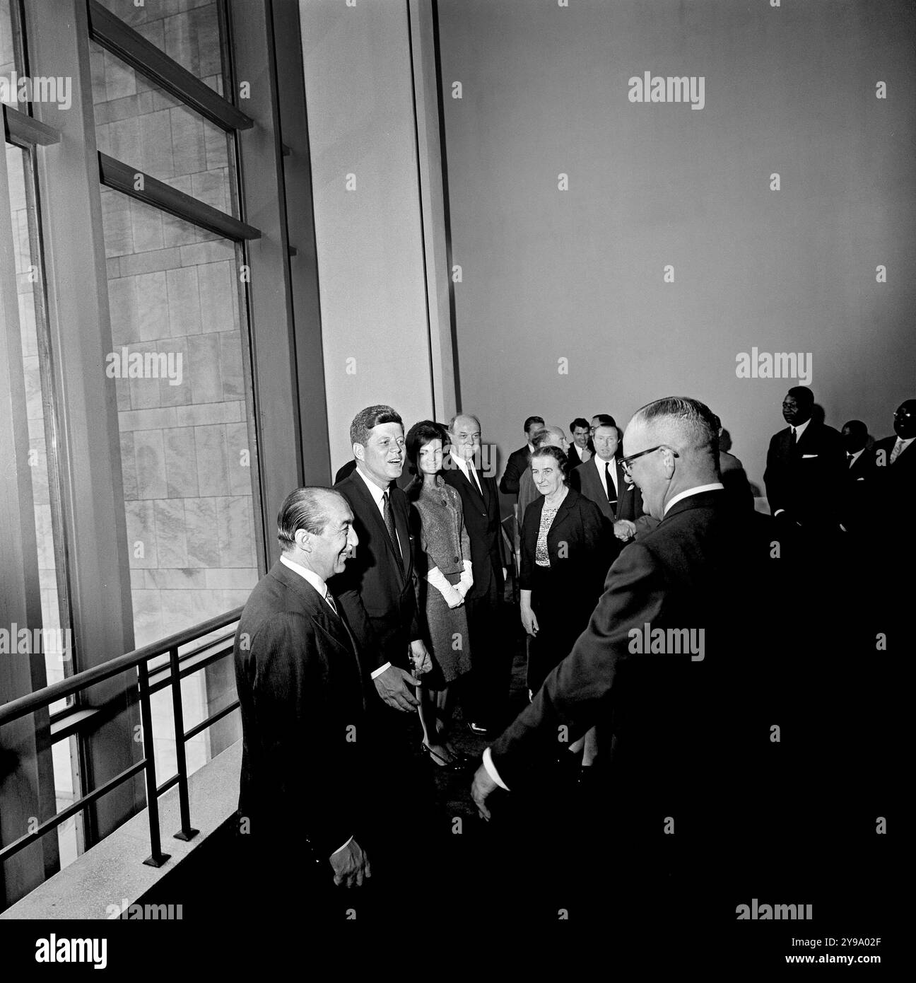 President of United Nations (UN) General Assembly Mongi Slim, U.S. President John Kennedy, First Lady Jacqueline Kennedy, U.S. Secretary of State Dean Rusk, and U.S. Ambassador to the UN Adlai Stevenson greeting Golda Meir, Foreign Minister of Israel, at reception for delegates to the General Assembly of the United Nations (UN) at United Nations Headquarters, New York City, New York, USA, Cecil Stoughton, White House Photographs, September 25, 1961 Stock Photo