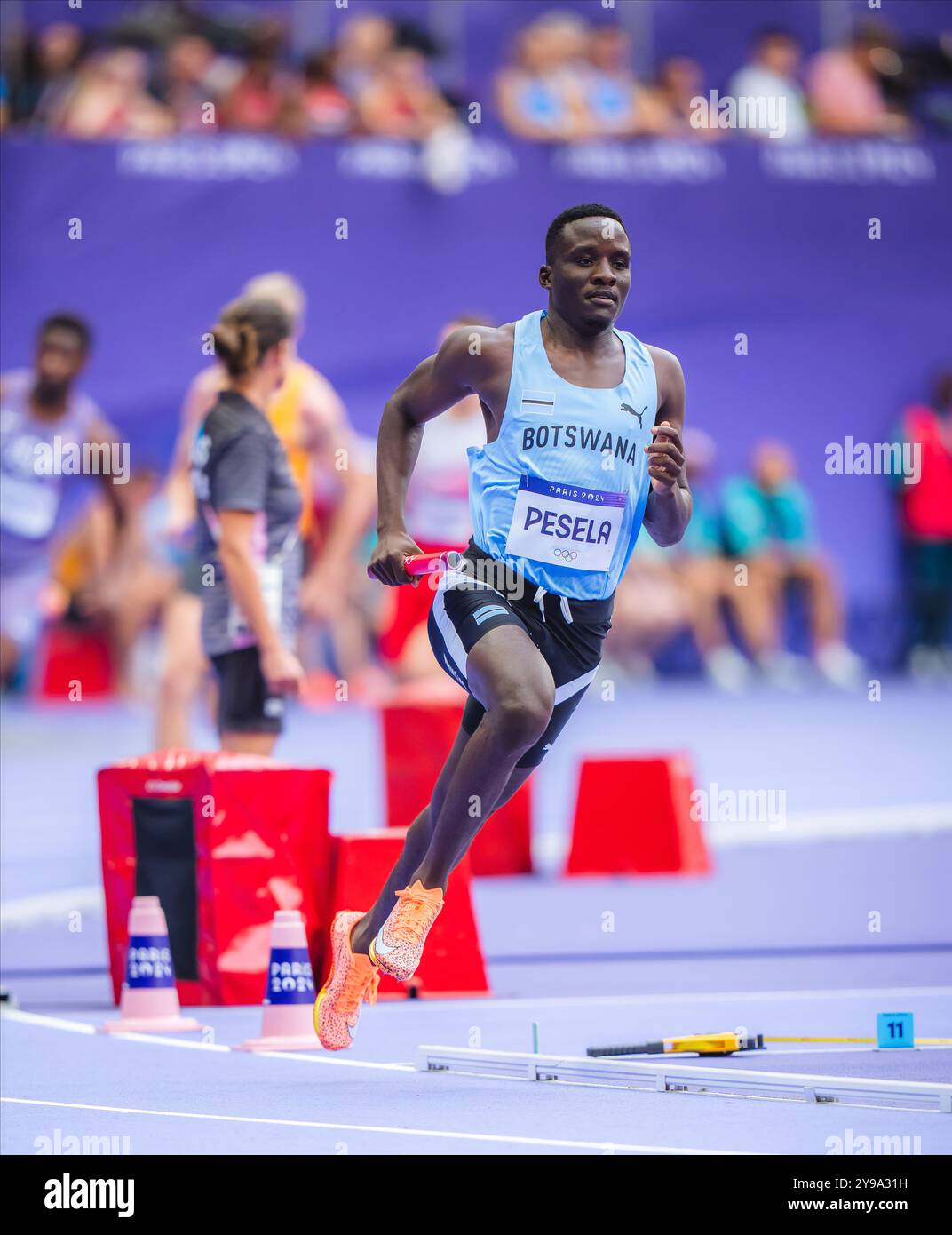 Anthony Pesela participating in the 4X400 meters relay at the Paris