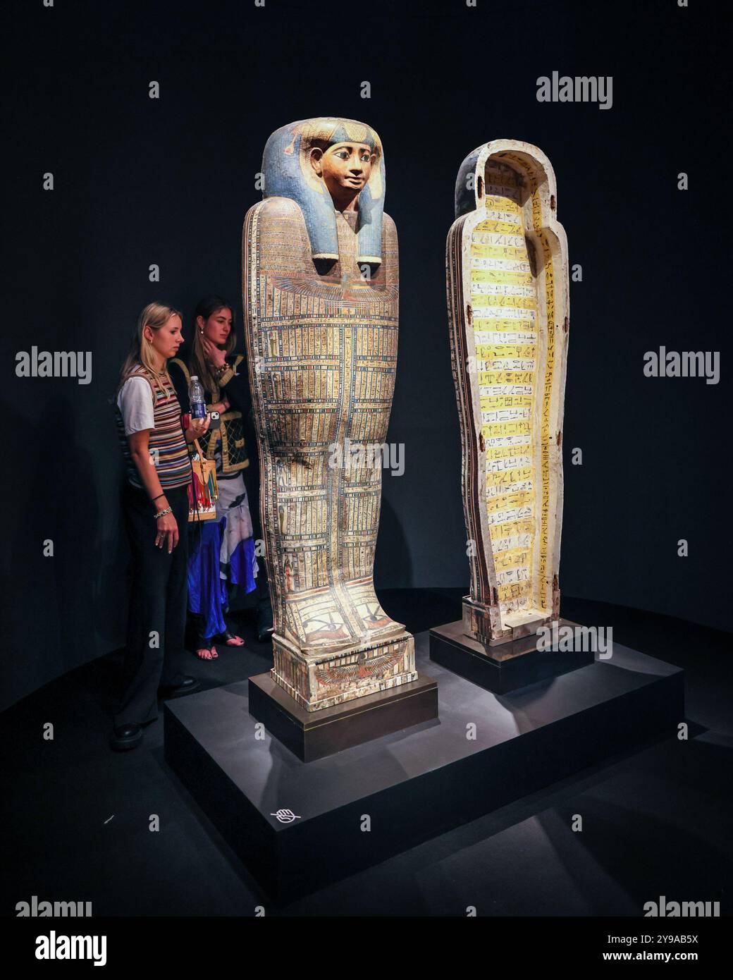 London, UK. 09th Oct, 2024. Visitors look at The Forgotten Princess, The Inner Sarcophagus of Princess Sopdet-em-haawt', Late 25th-Early 26th Dynasty Egypt at David Aaron. Frieze Masters preview day. Frieze Masters gives a unique view on the relationship between historical art and contemporary practice, showing work made before the year 2000 whereas Frieze London presents work created mainly post-2000. Credit: Imageplotter/Alamy Live News Stock Photo