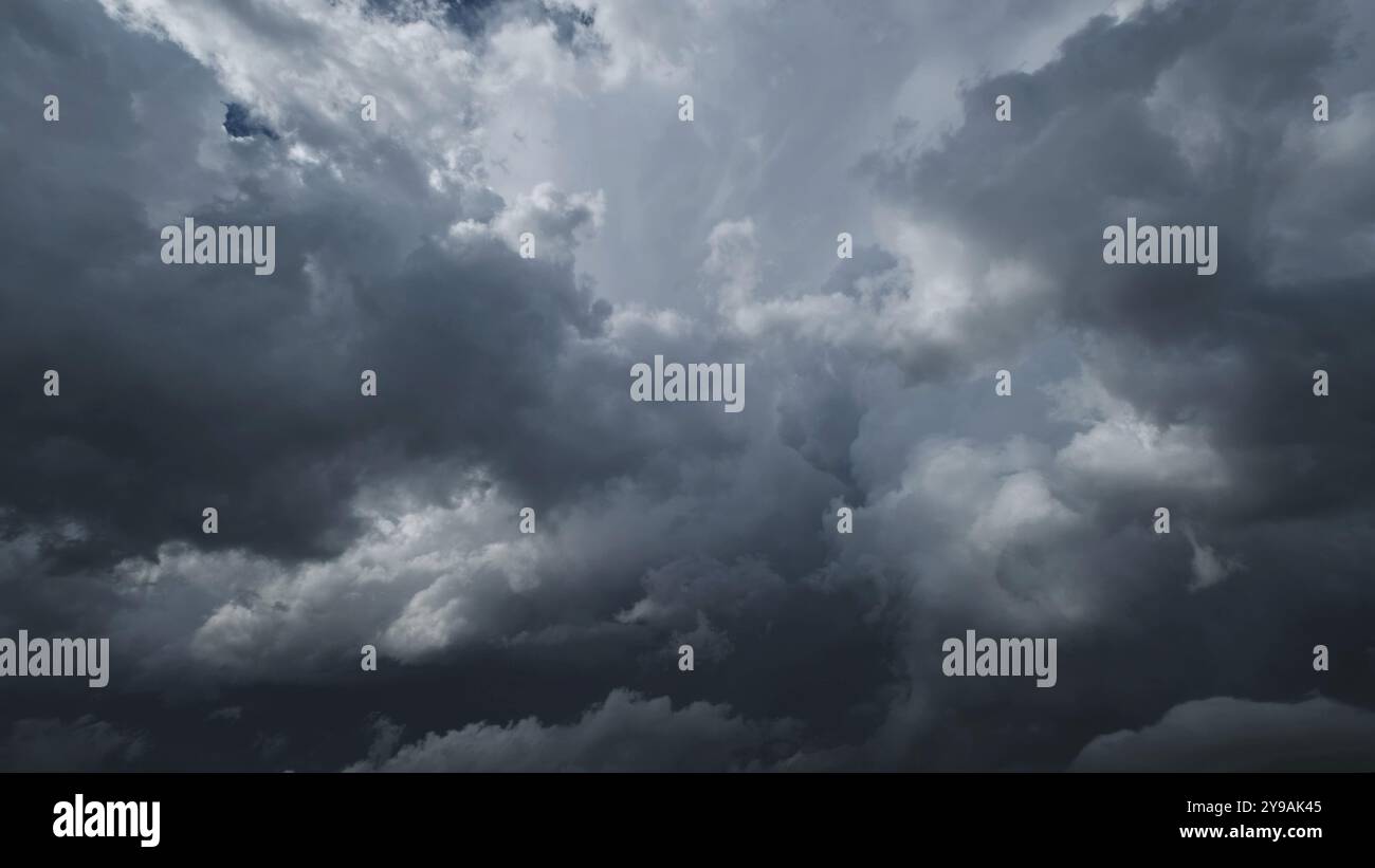 Dramatic dark storm clouds in sky background Stock Photo