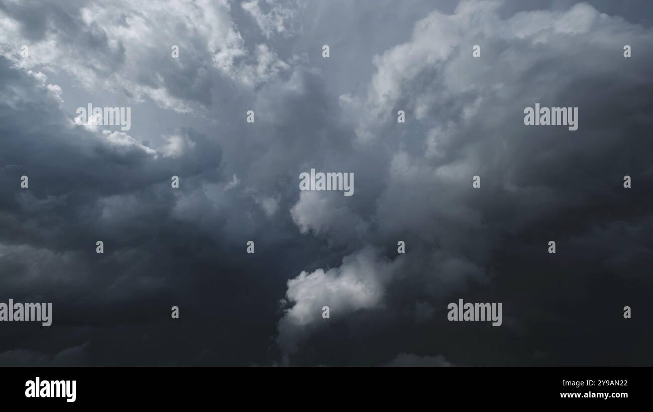 Dramatic dark storm clouds in sky background Stock Photo