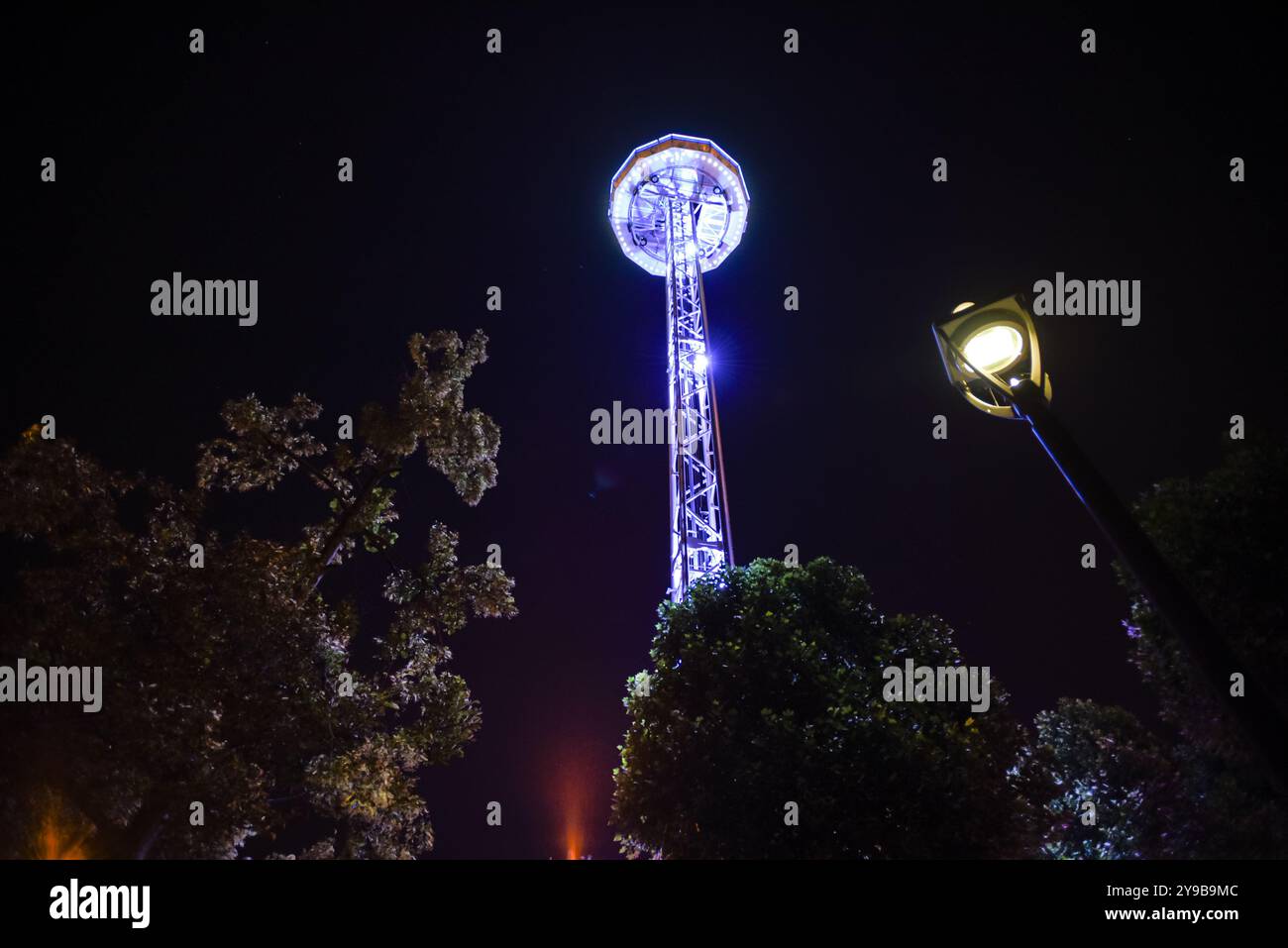 Modern Panoramic Tower Shining in Luxembourg City at Night Stock Photo