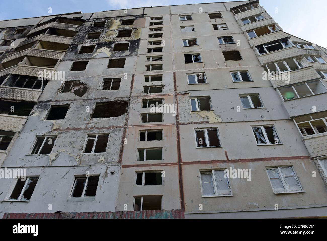 Apartment building in Saltivka district of Kharkiv, NE Ukraine with damage from artillery shelling in the Russian invasion Stock Photo