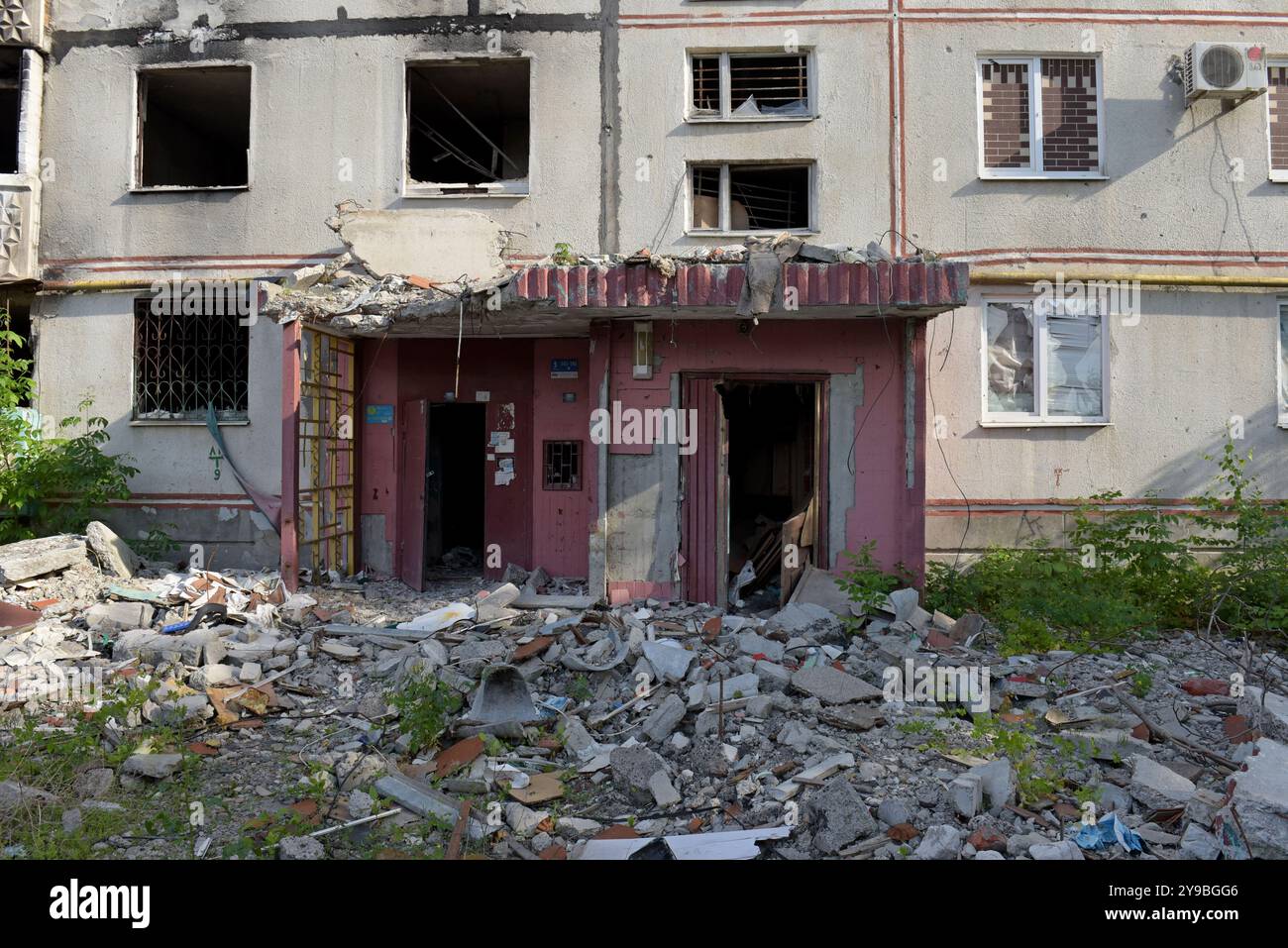 Apartment building in Saltivka district of Kharkiv, NE Ukraine with damage from artillery shelling in the Russian invasion Stock Photo