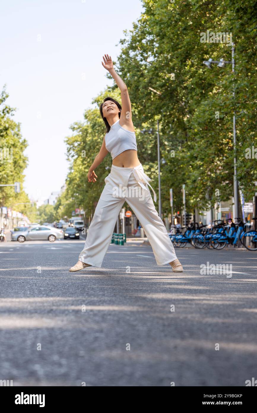 Active woman dances gracefully in hi-res stock photography and images ...