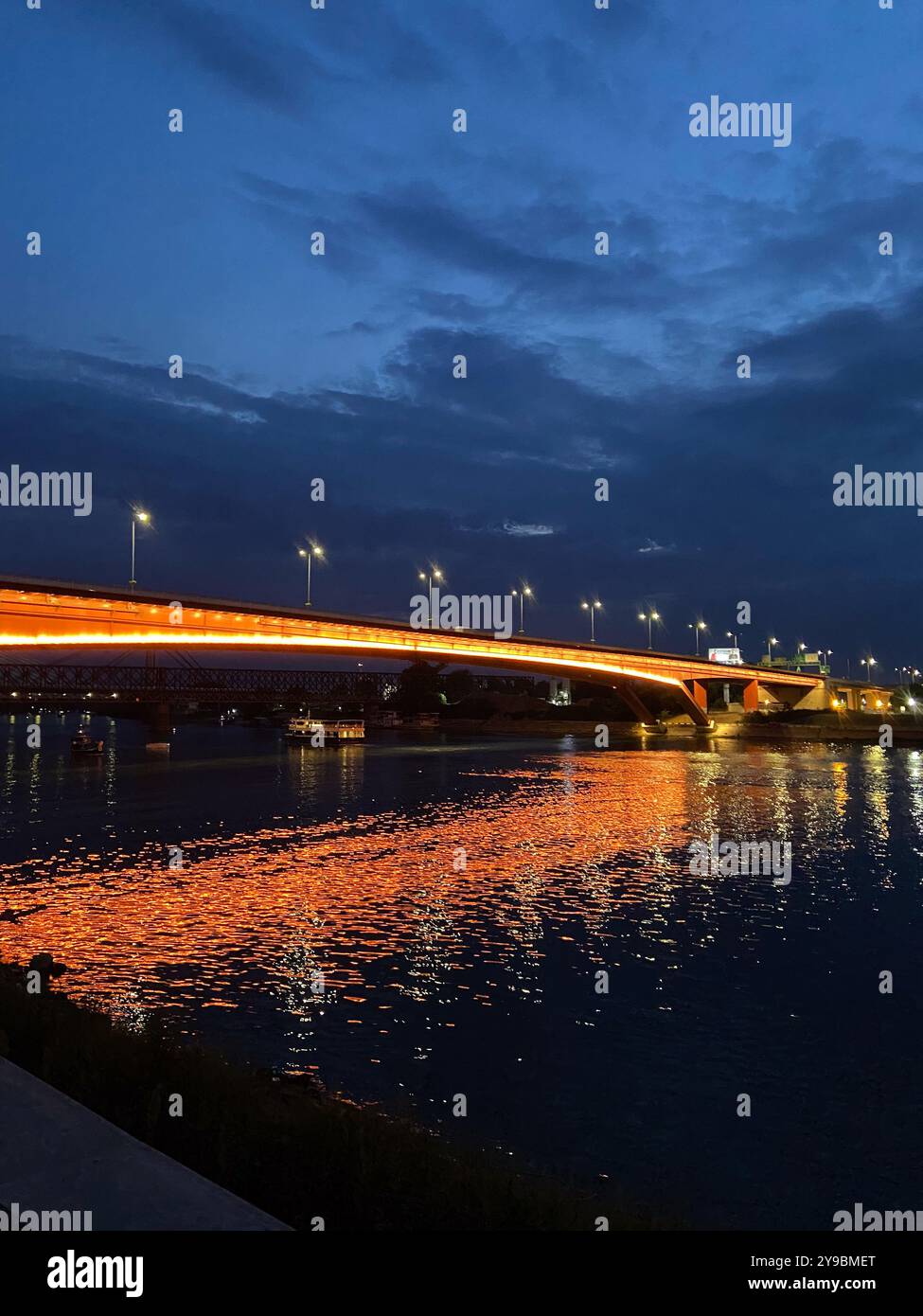 Bridge lights shimmer across water hi-res stock photography and images ...