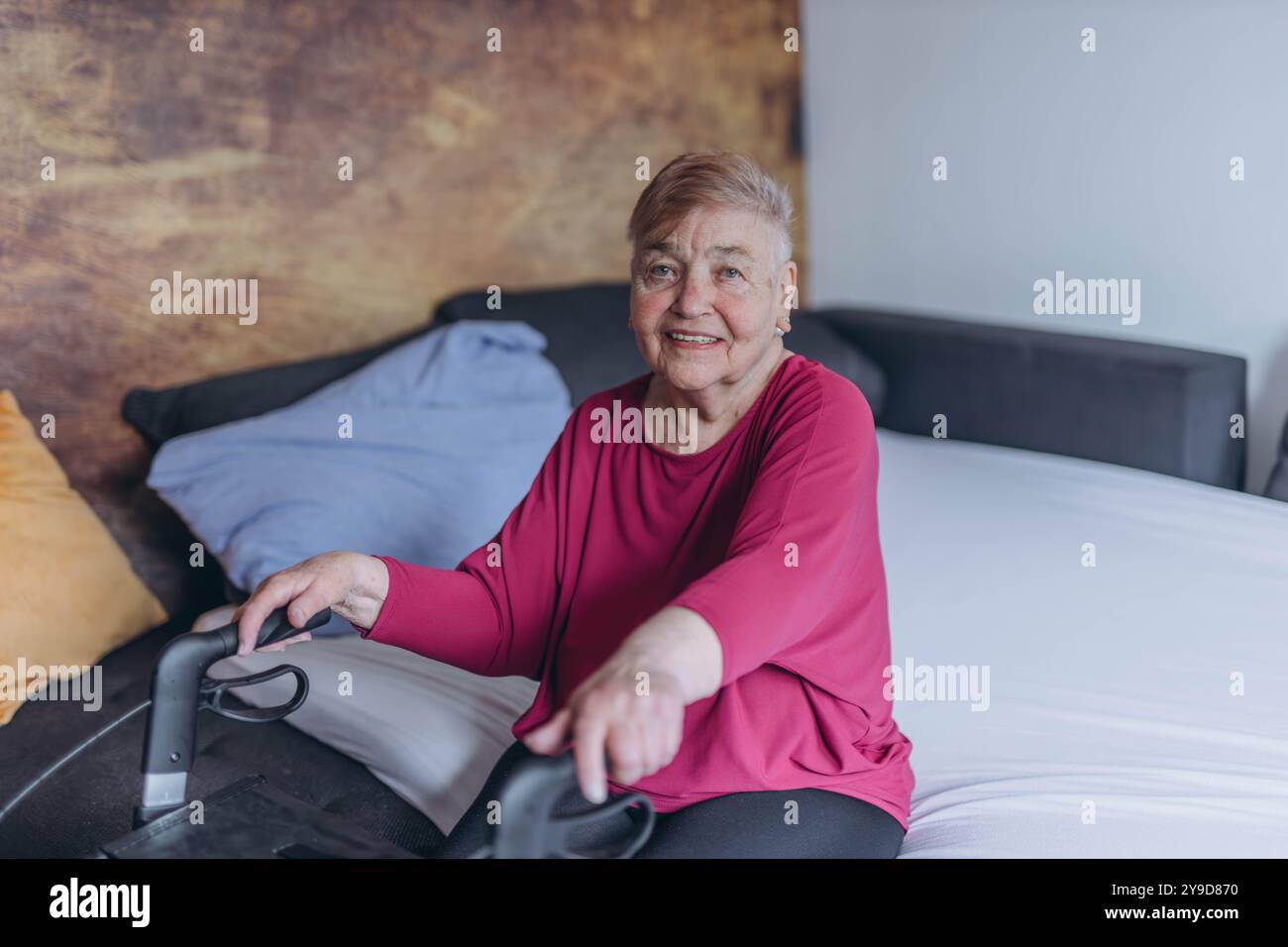 Elderly woman walker looks home hi-res stock photography and images - Alamy