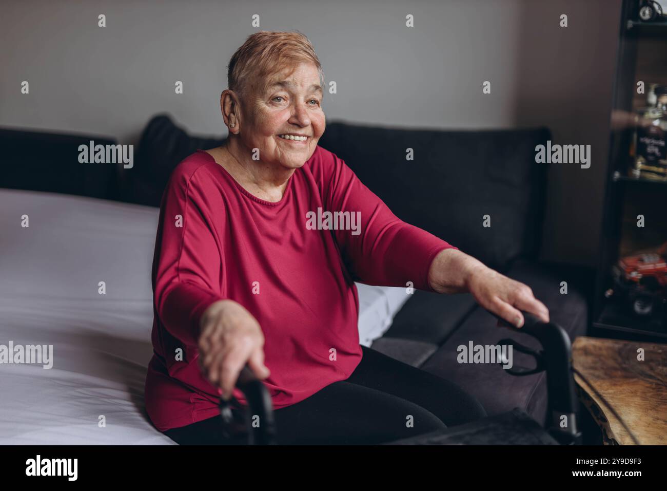 Elderly woman walker looks home hi-res stock photography and images - Alamy