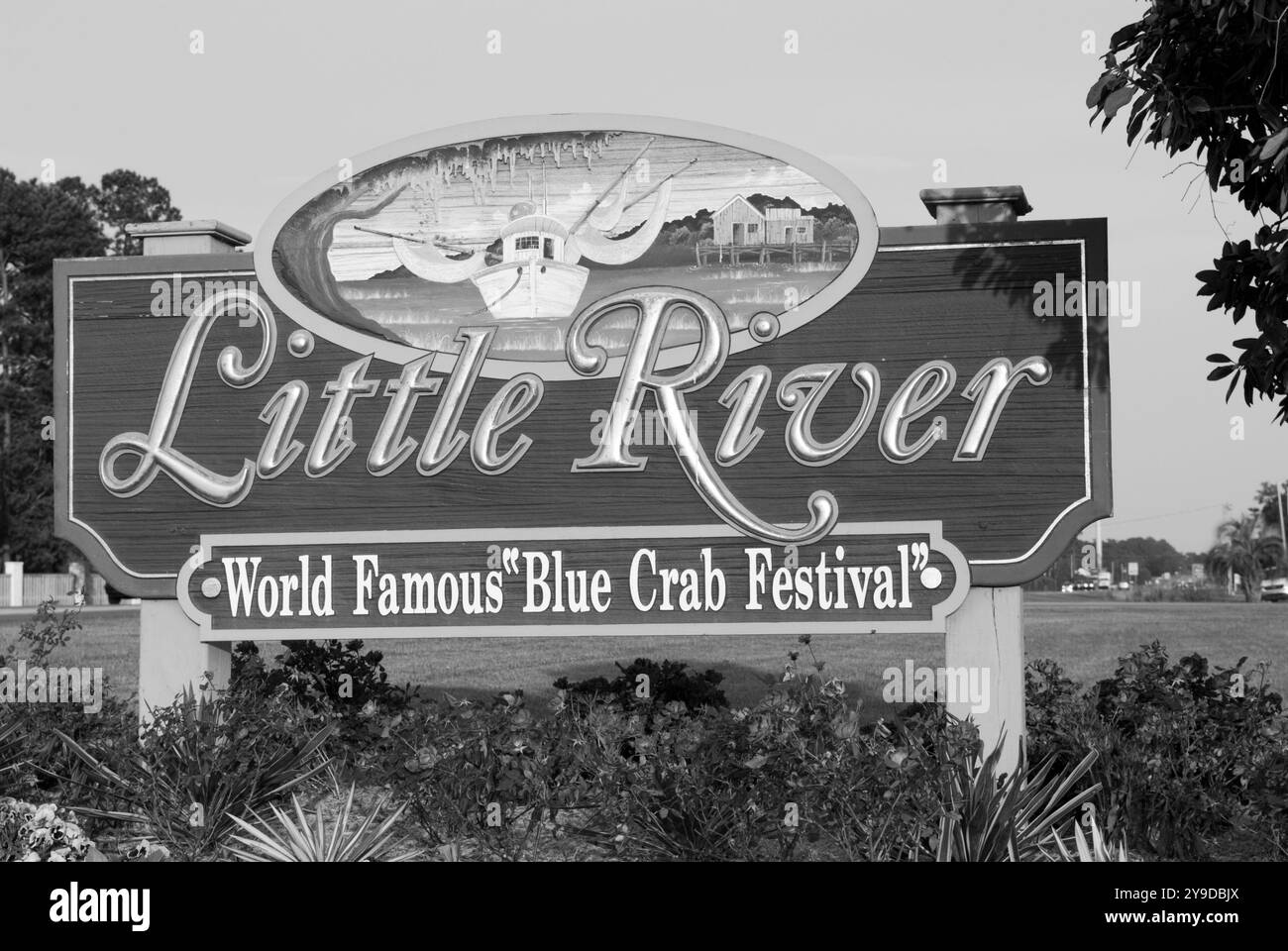 Welcome sign to Little River, South Carolina, USA, a coastal town known for fresh seafood, fishing, and the annual Blue Crab Festival. Stock Photo
