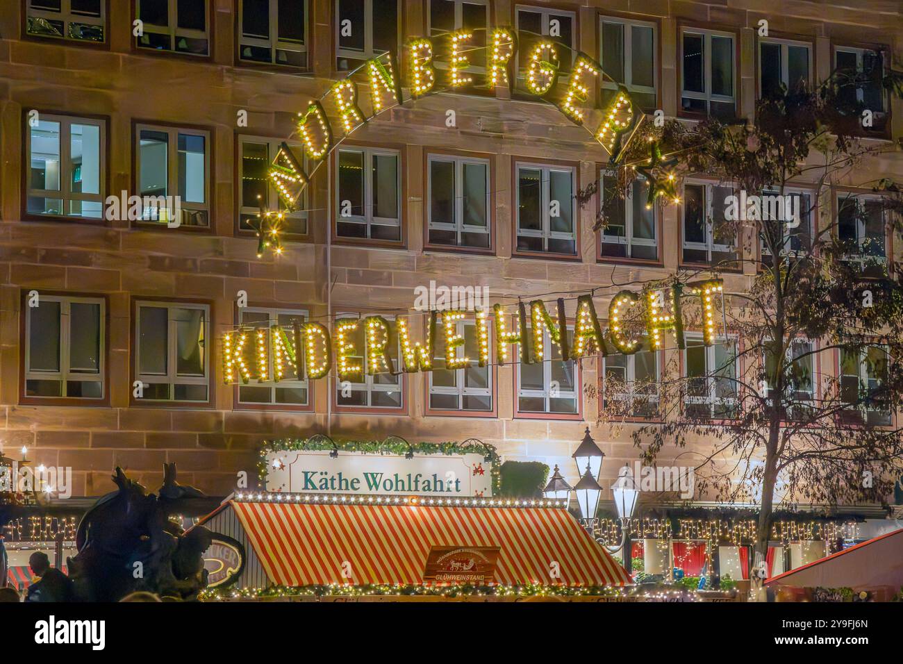 Christkindlesmarkt or Christmas Market or Weihnachtsmarkt whit Christmas illuminations in Nuremberg, Germany Stock Photo