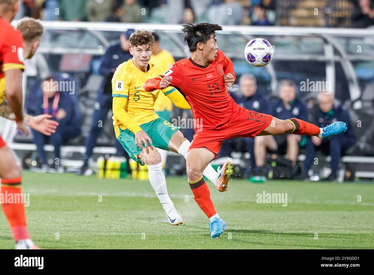 Adelaide Oval, Adelaide, Australia 10th October2024, International, World Cup Qualification, AFC Australia vs China PR,  Socceroo; Jordan BOS chips a pass over China PR; Hetao HU   Credit; Mark Willoughby/ALAMY Live News Stock Photo