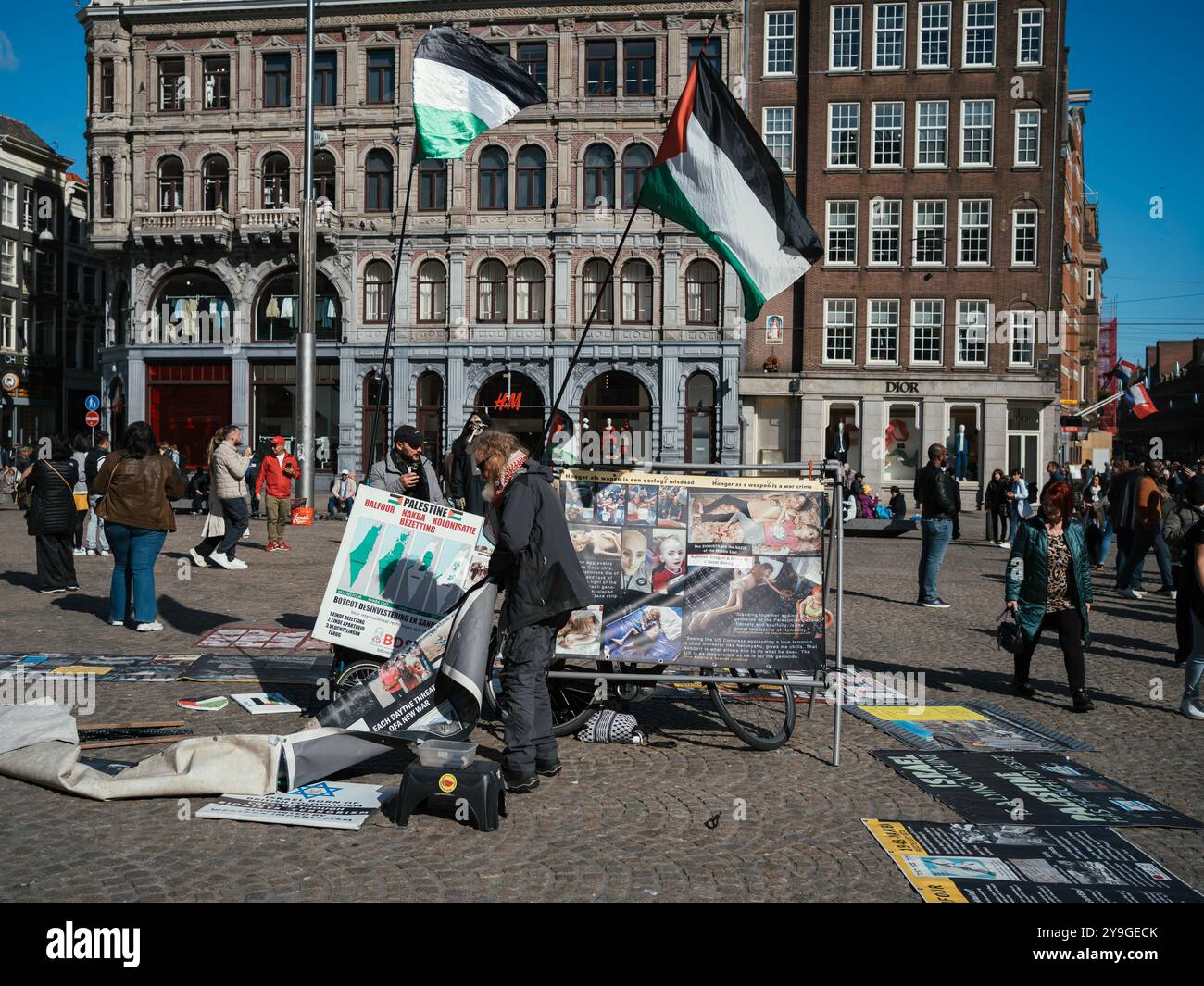 Peaceful anti war protest in central square Amsterdam. Israeli palestine conflict. Stock Photo