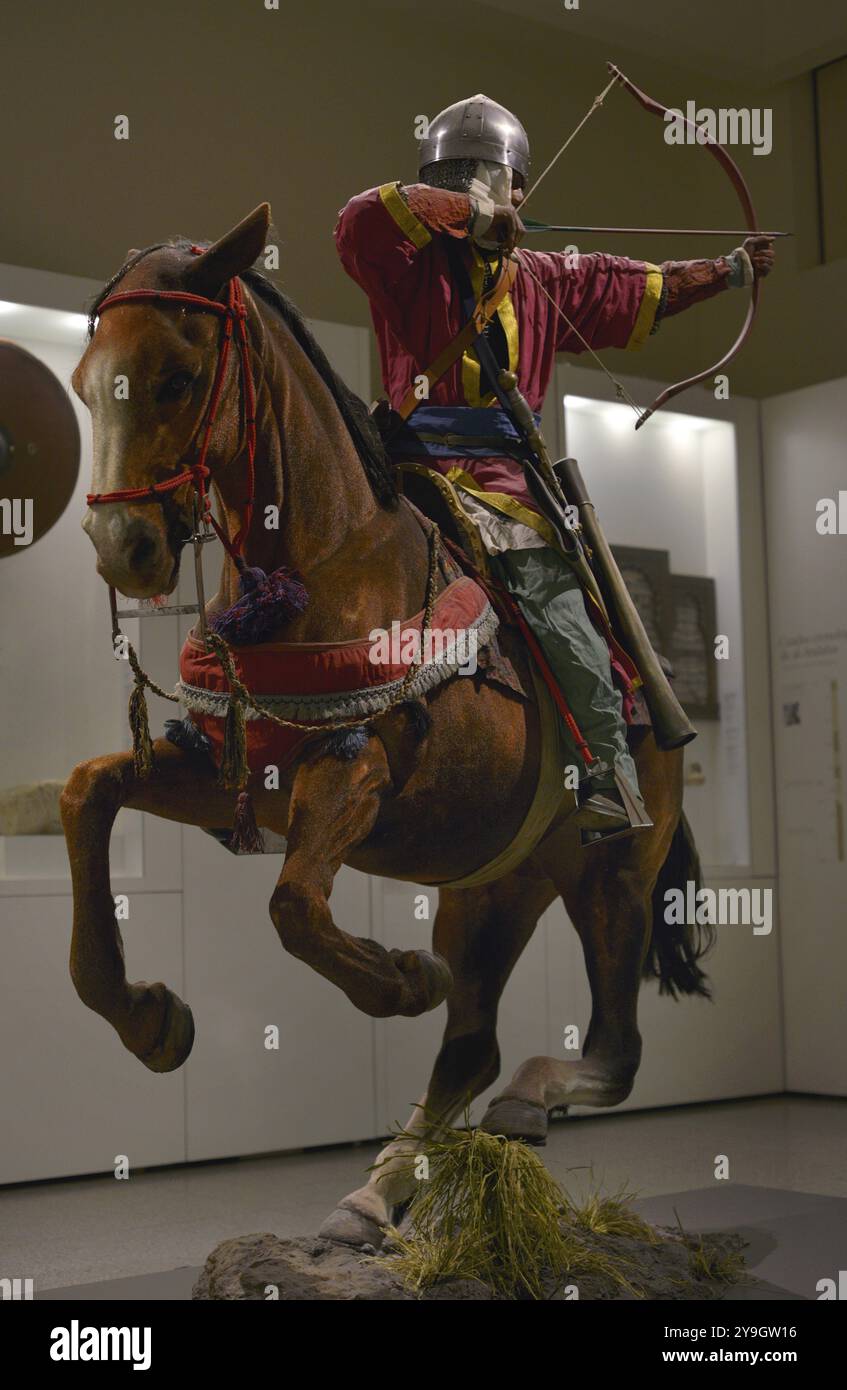 Light cavalryman from the Kingdom of Granada shooting a compound bow. Replica. Army Museum. Toledo, Spain. Stock Photo