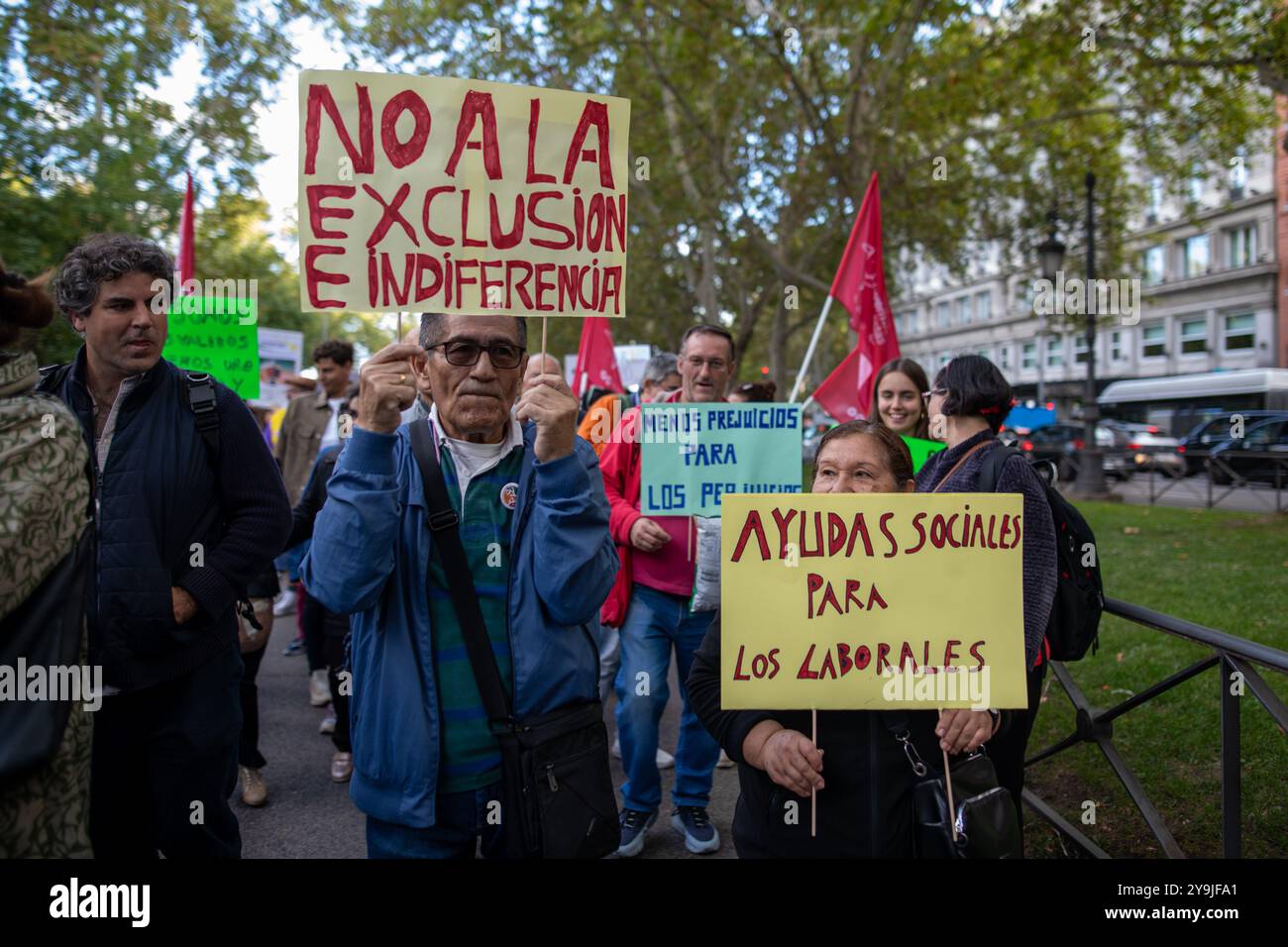 Protesters hold placards expressing their opinion during the ...