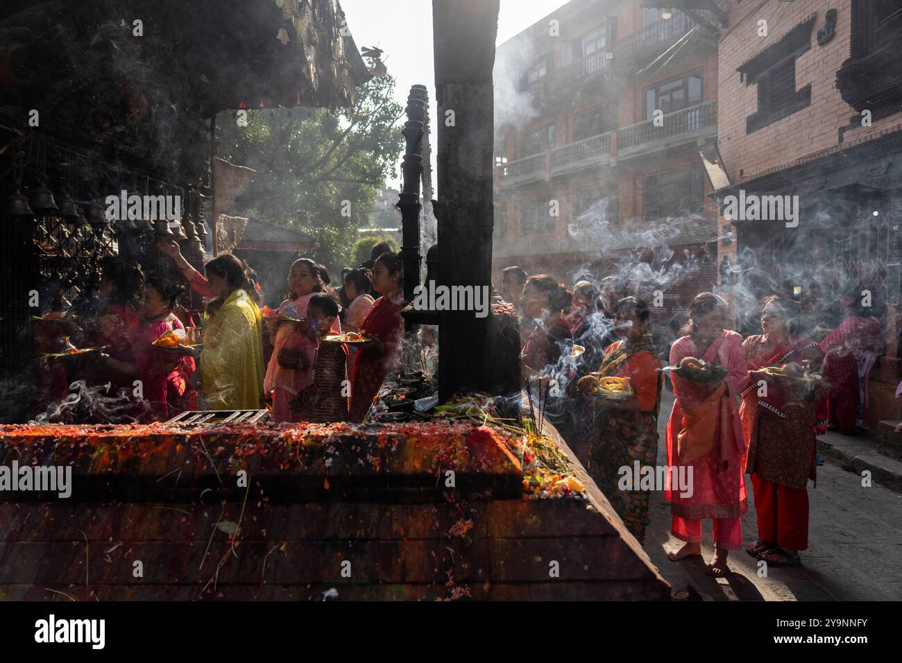 Devotees wait to perform rituals inside the Siddhikali Temple during ...