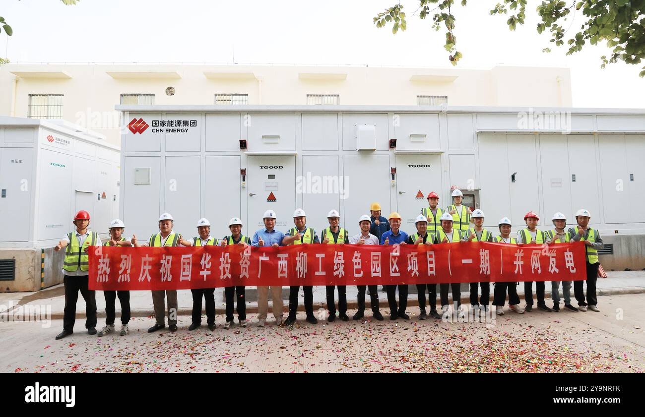LIUZHOU, CHINA - OCTOBER 10, 2024 - Engineers and technicians pose for ...