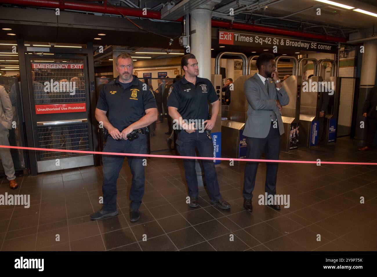 New York, United States. 10th Oct, 2024. New York City Police Department (NYPD) officers seen at Mayor Adams subway safety and social services announcement press conference inside the Times Square 42nd Street subway station in midtown Manhatta. Mayor Adams announced the PATH initiative, a multi-agency effort involving the NYPD, Department of Homeless Services and healthcare workers, using a 'co-response' model to addresses both safety and mental health needs to assist more New Yorkers. Credit: SOPA Images Limited/Alamy Live News Stock Photo