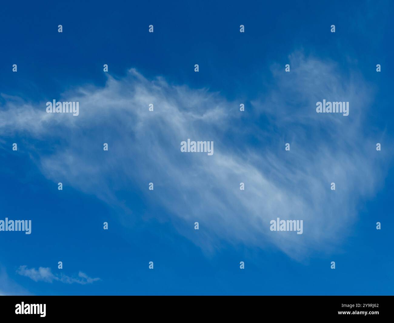 Blue sky with veil clouds background texture Stock Photo