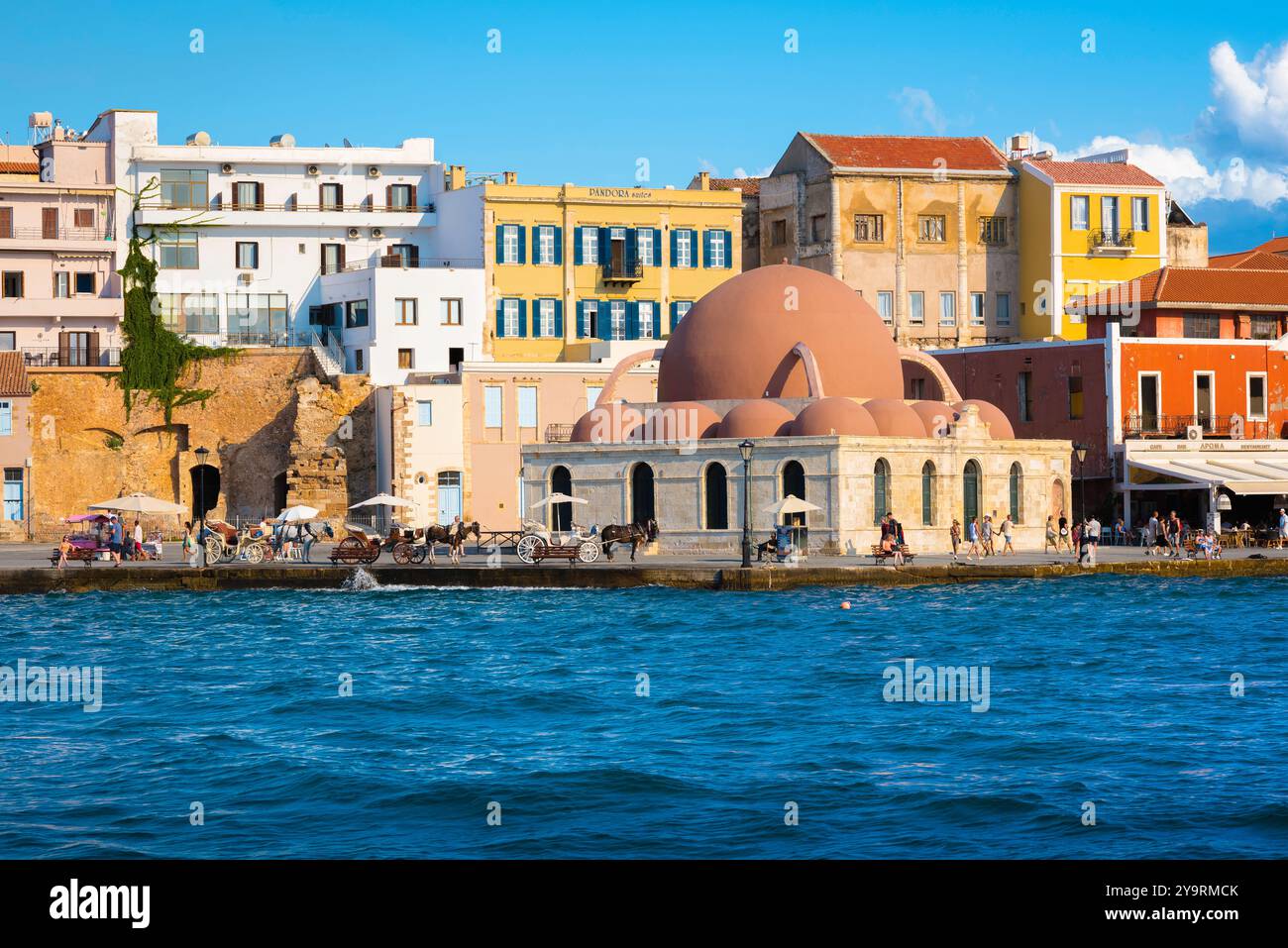 Chania Mosque Crete, view of the Kucuk Hasan Pasha Mosque - now an exhibition space - sited in the old town harbour area of Chania (Hania), Crete Stock Photo