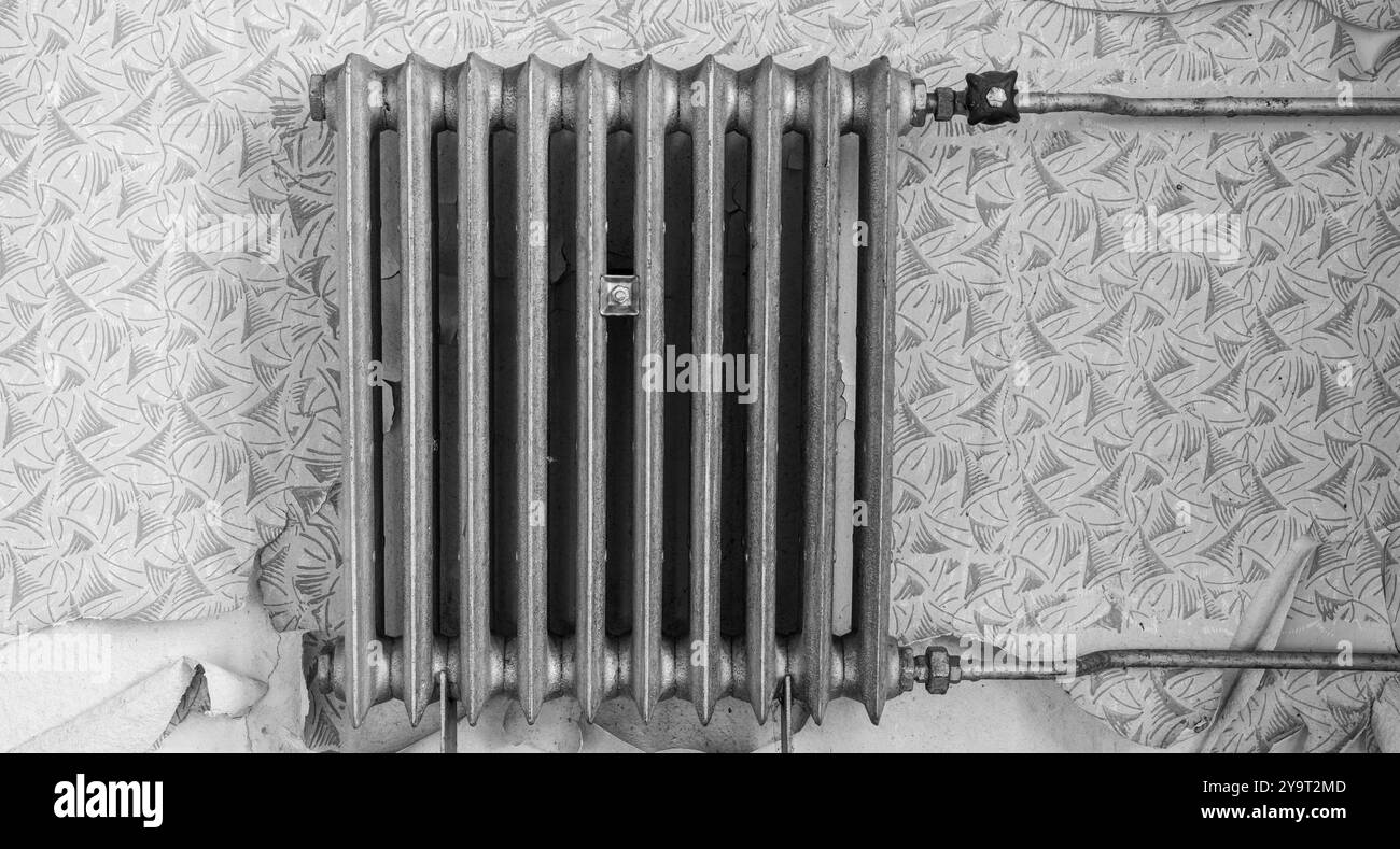 old vintage radiator on the wall Stock Photo
