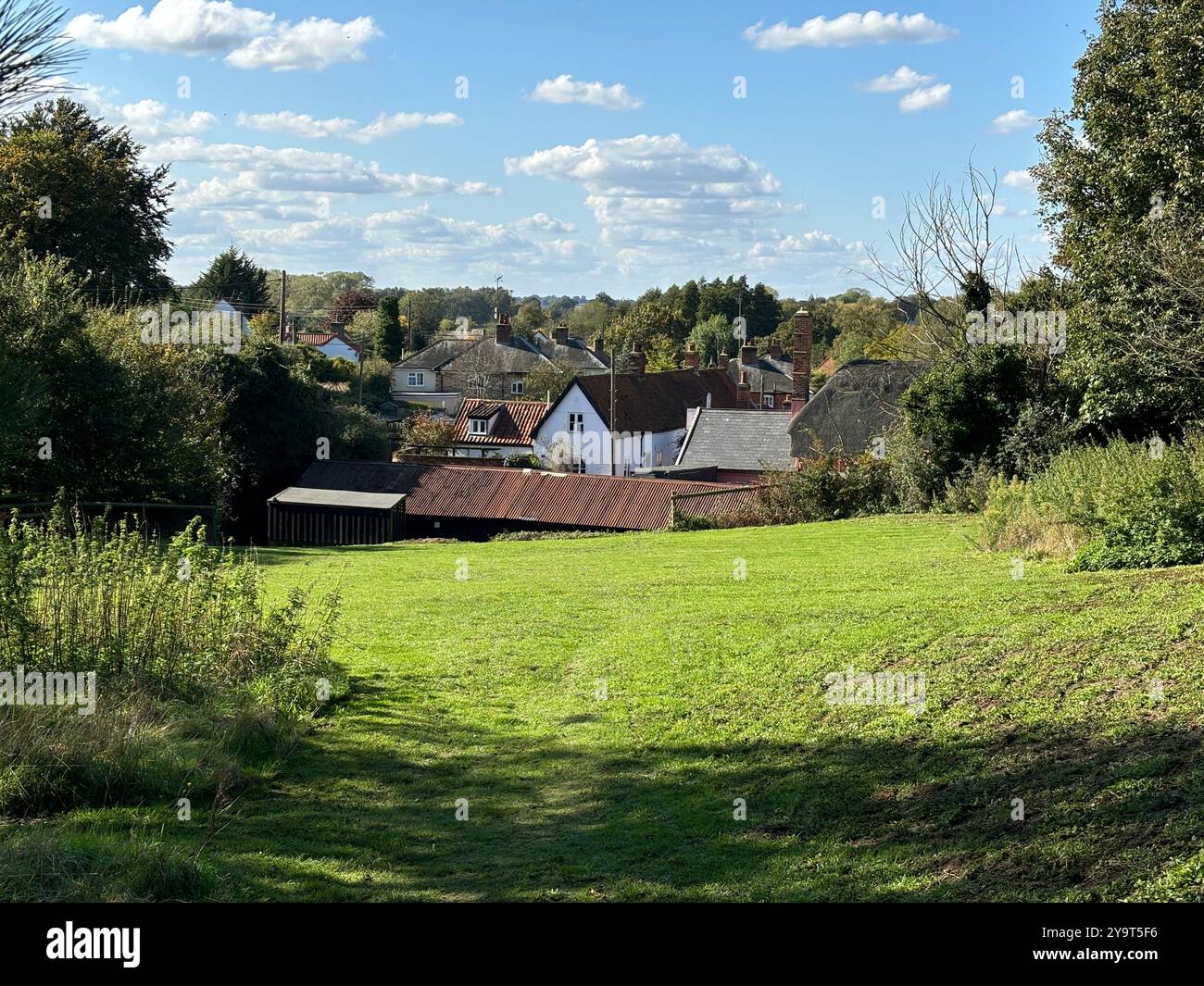 Landscape view of roofs in nucleated village, Shottisham, Suffolk, England, UK - Smartphone Captured Stock Image